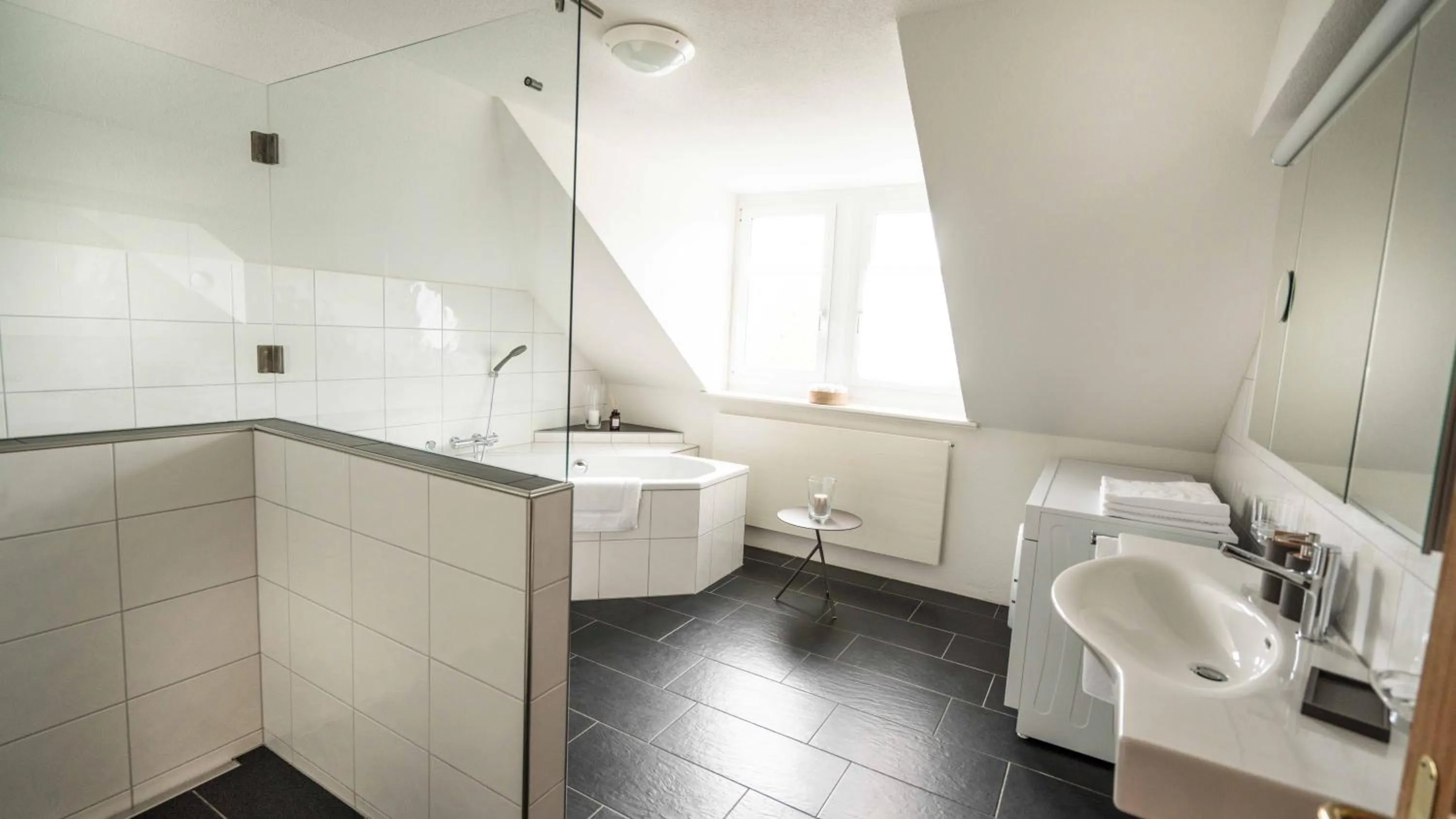 Bathroom in Löwenplatz Apartment near Station by Airhome
