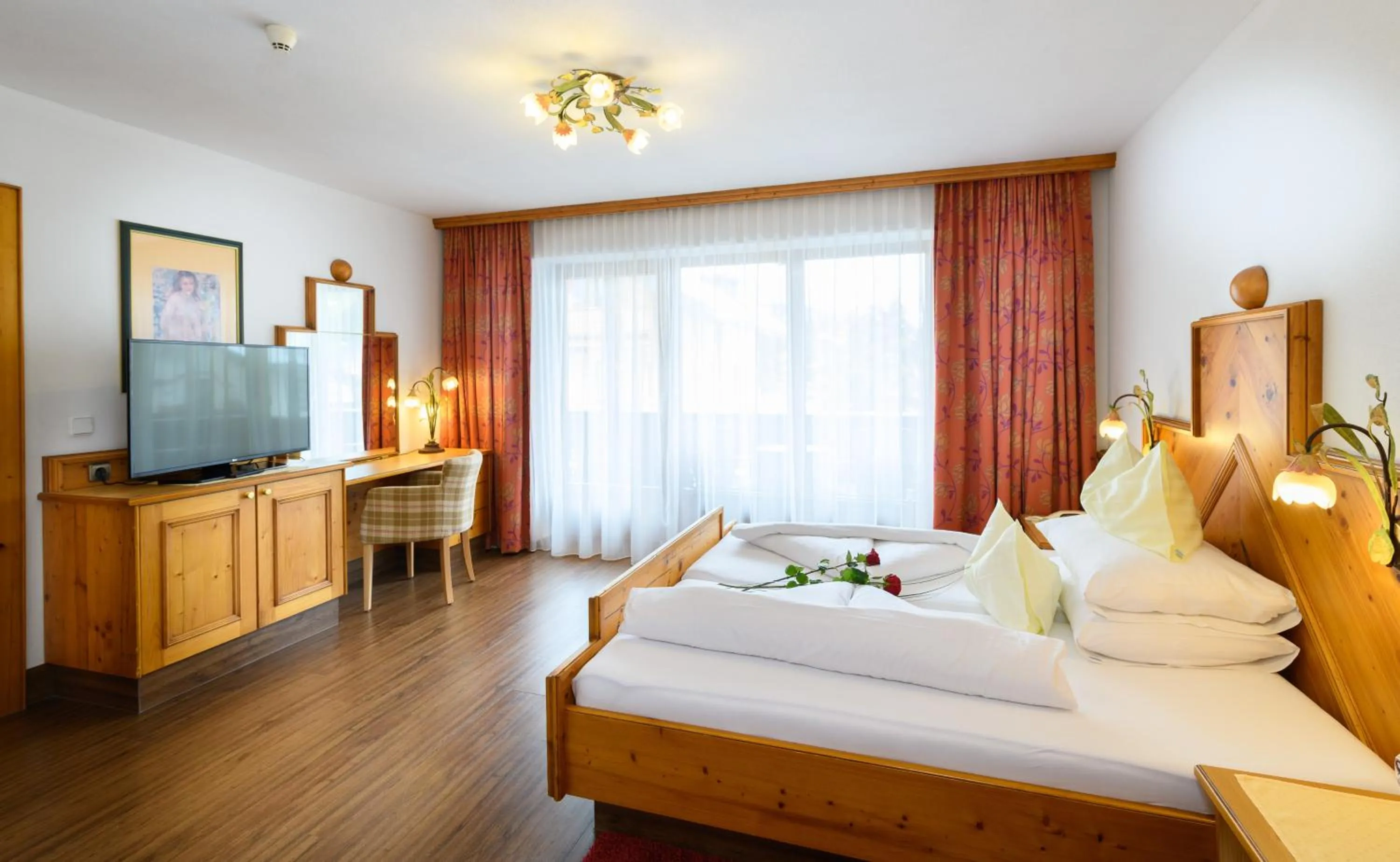 Photo of the whole room, Bed in Alpenpark Resort Superior