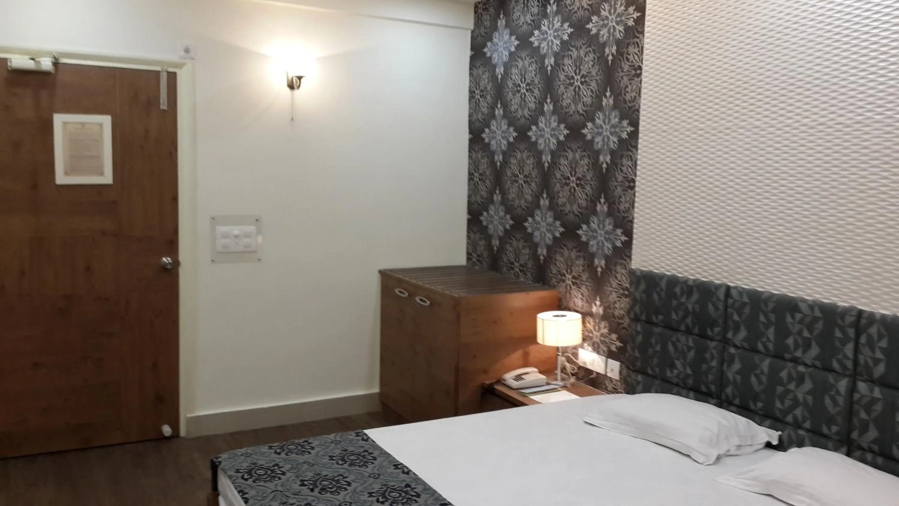 Bed in Hotel Rushabh Home