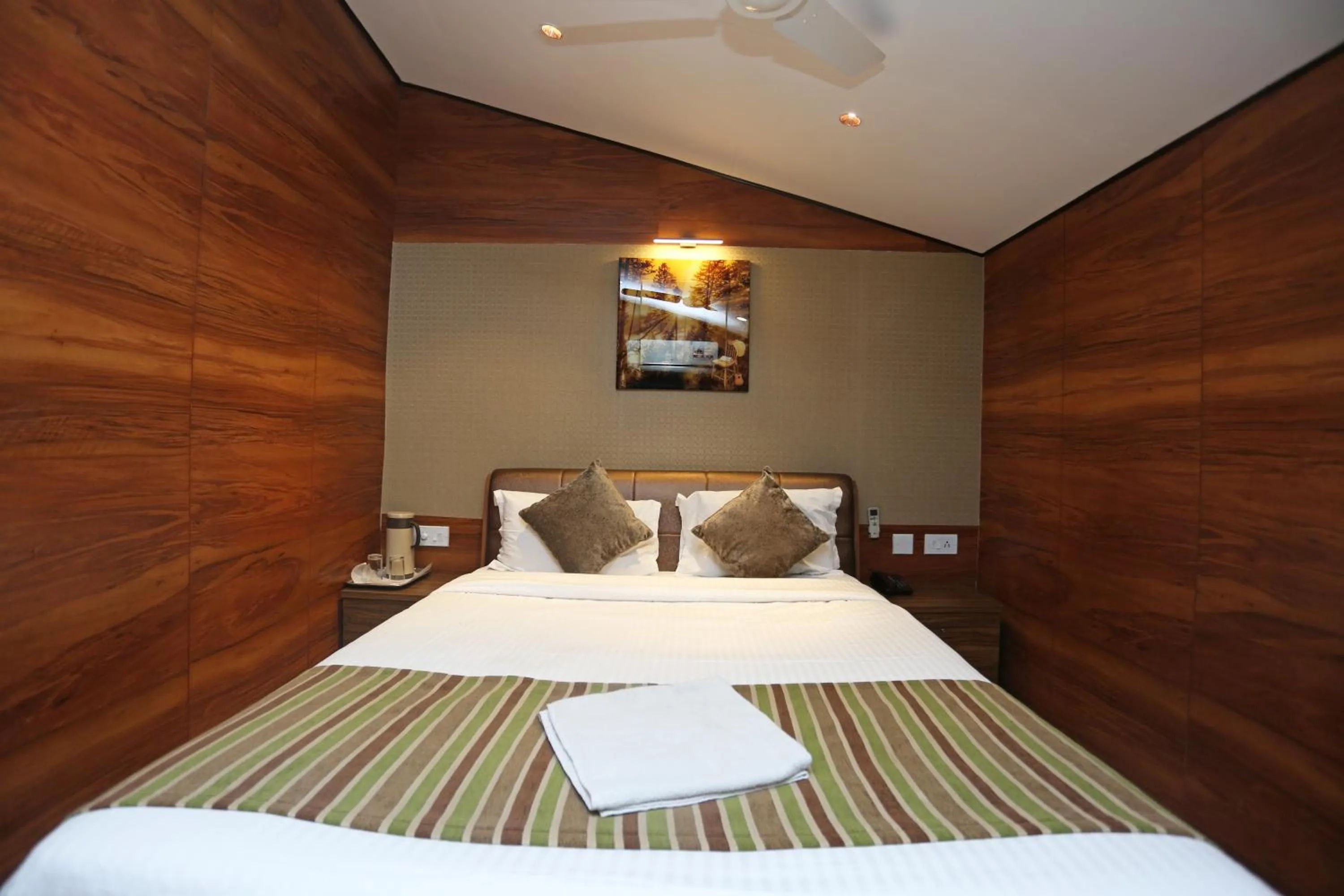 Bed in Hotel Rushabh Home