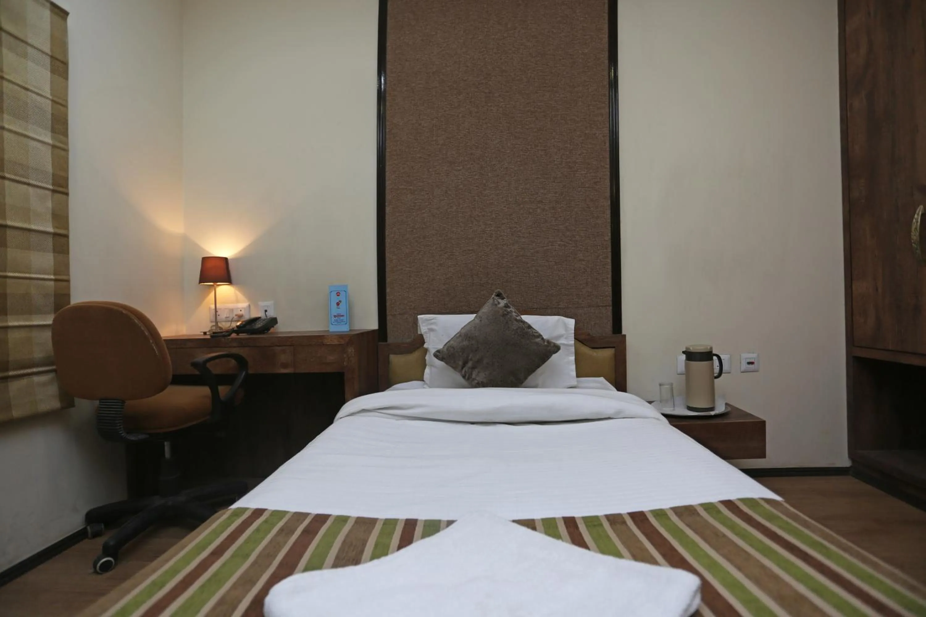 Bedroom, Bed in Hotel Rushabh Home