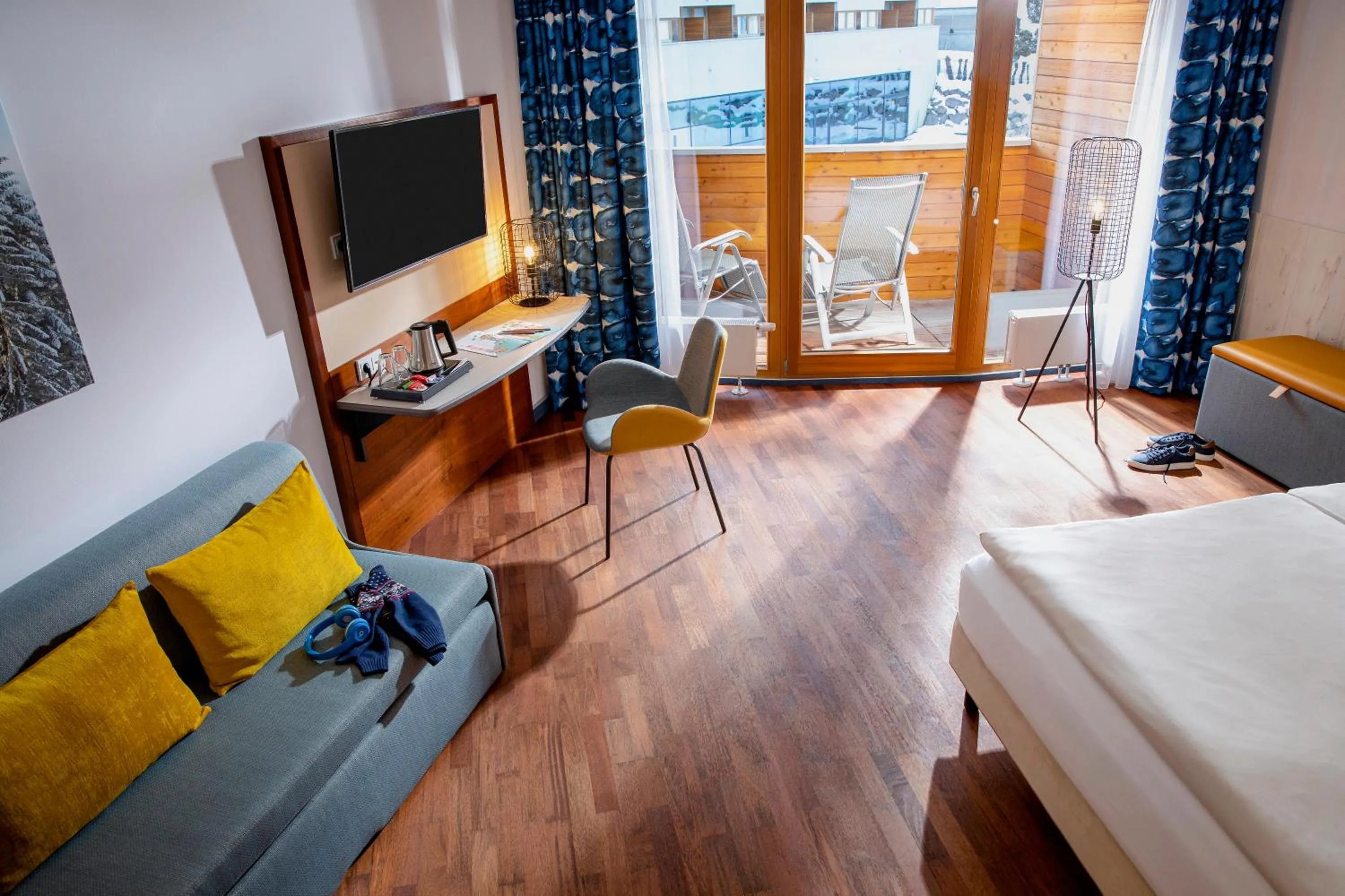 Living room, Bed in TUI BLUE Fieberbrunn