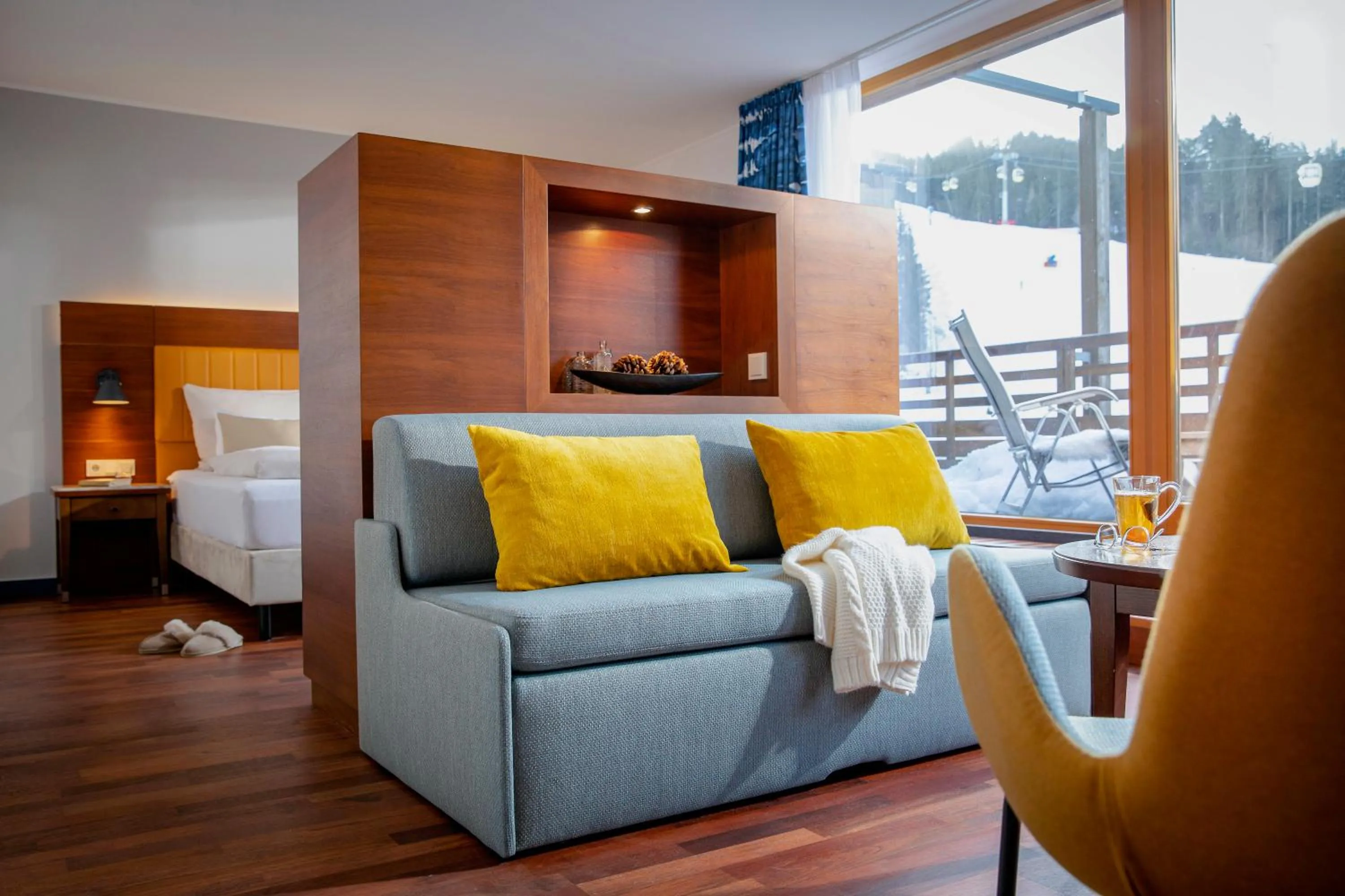 Living room, Bed in TUI BLUE Fieberbrunn