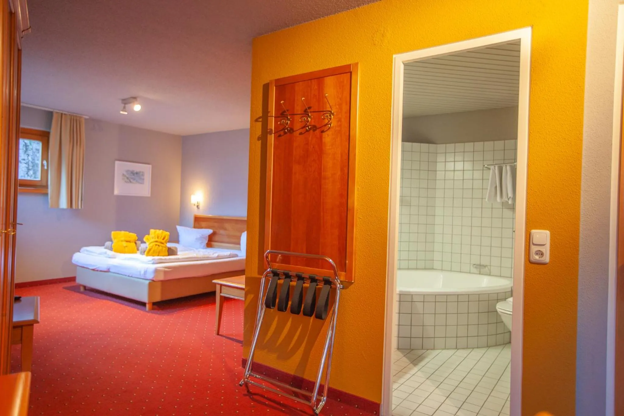 Photo of the whole room, Bed in Walliserhof