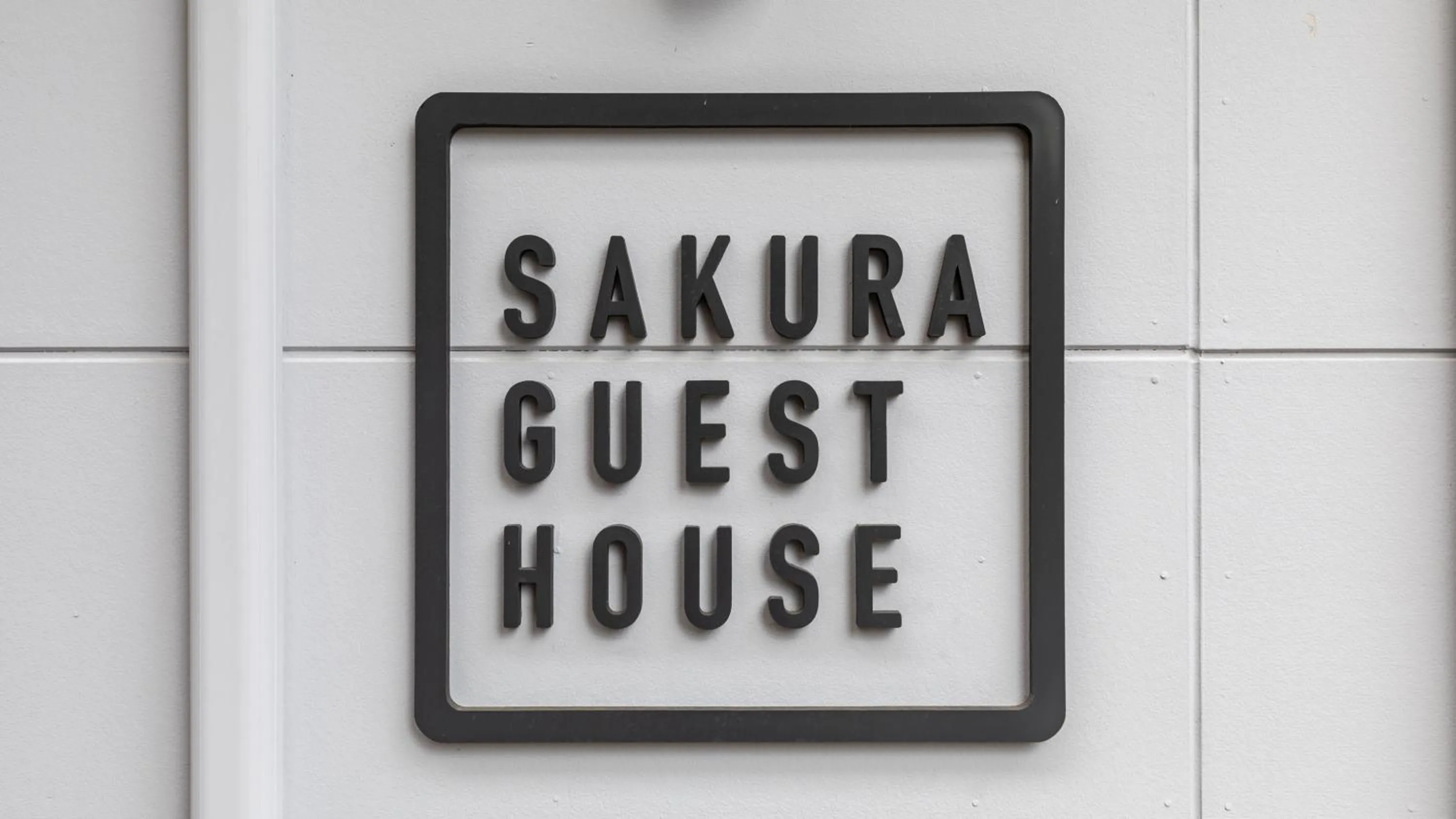 Property logo or sign in Sakura Guesthouse