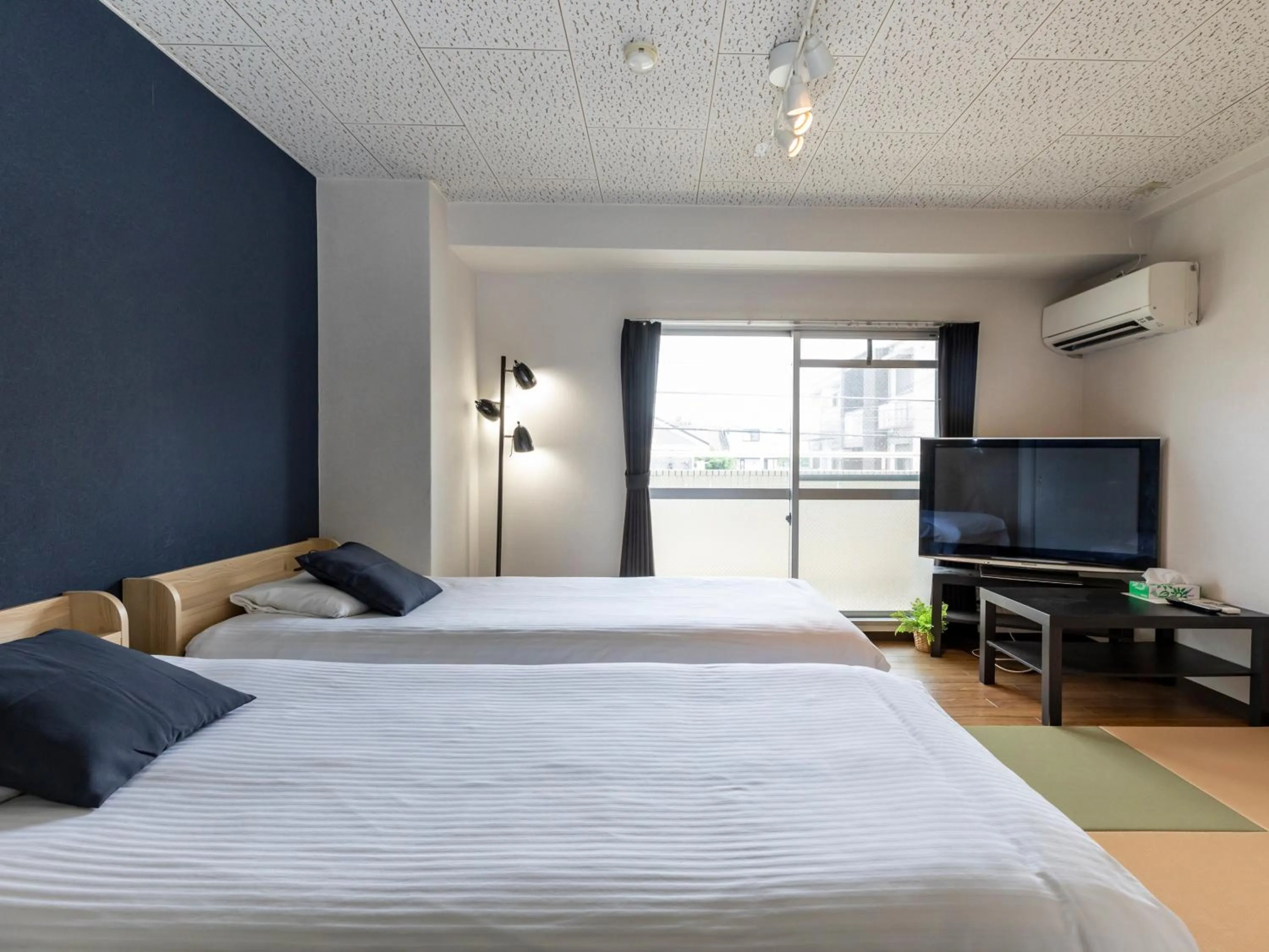 Photo of the whole room, TV/Entertainment Center in Sakura Guesthouse