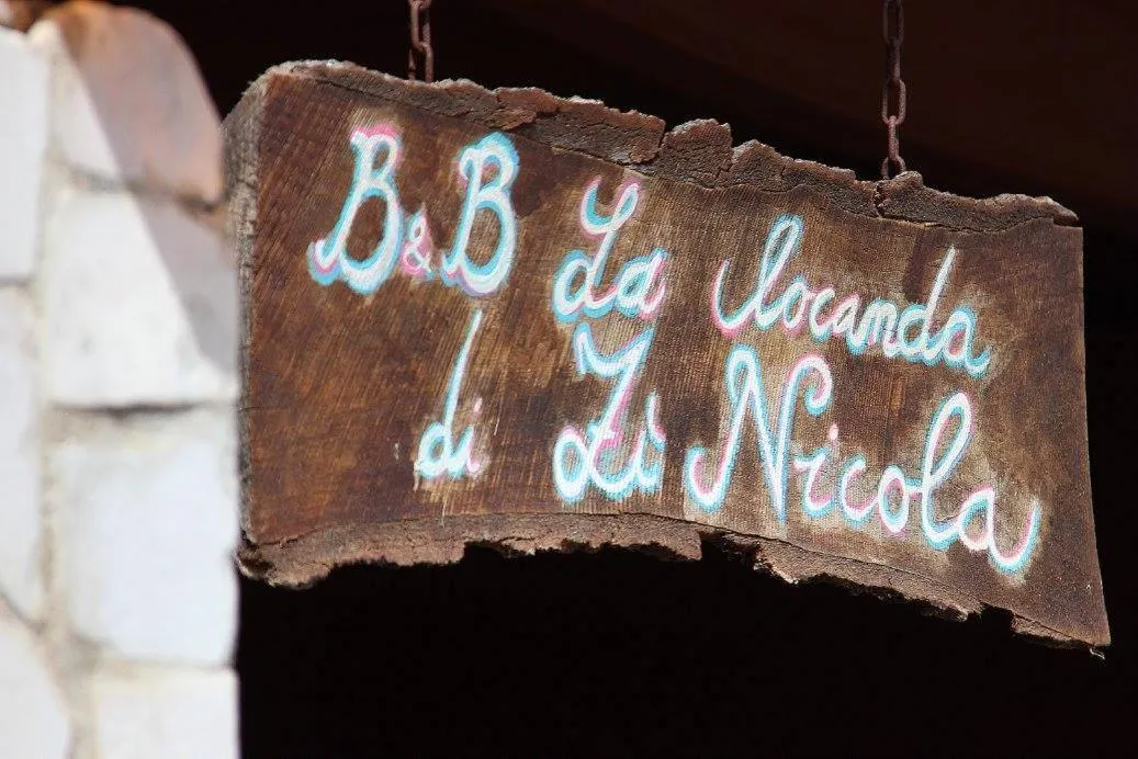 Property logo or sign in La Locanda di Zì Nicola