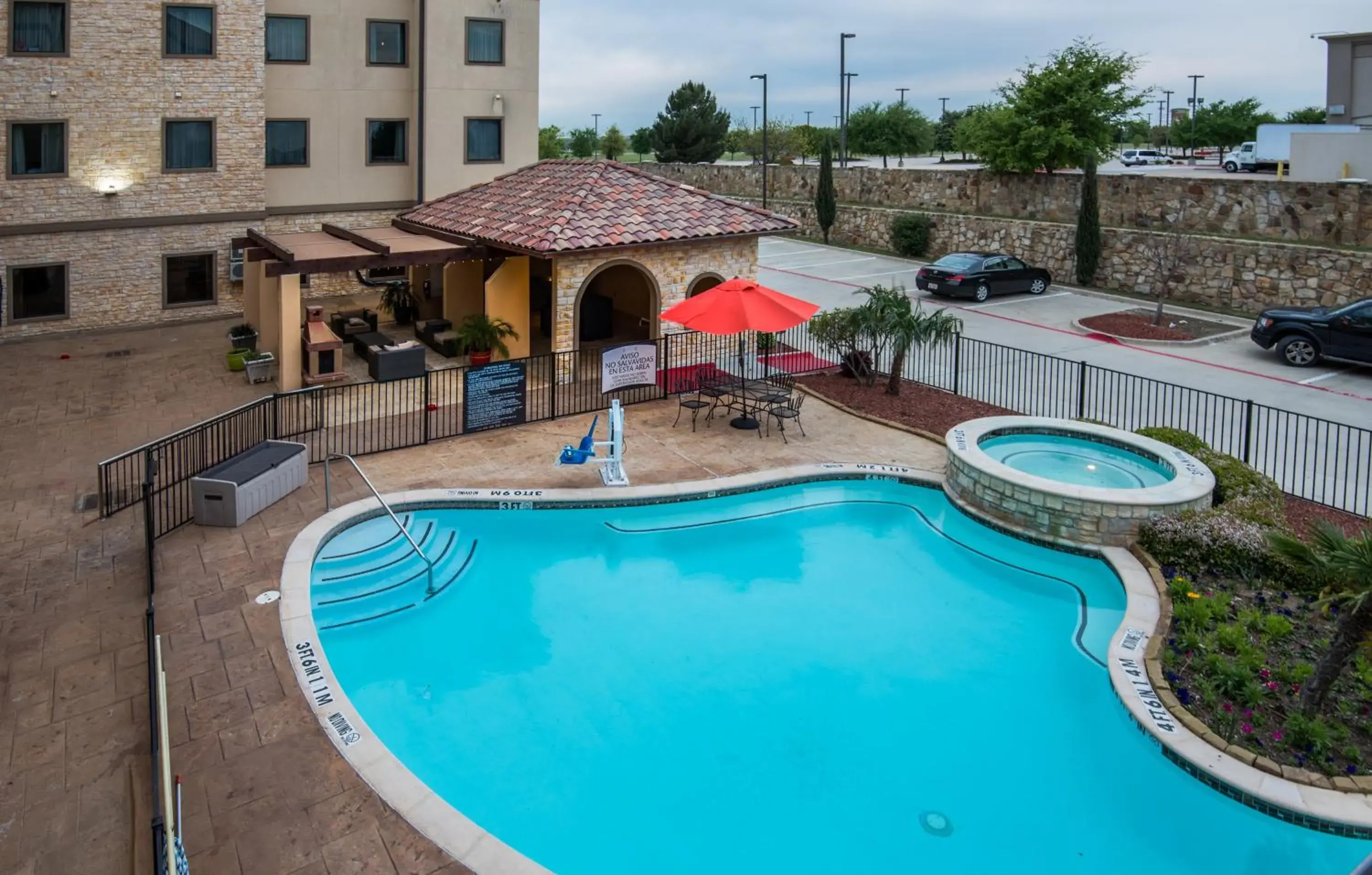 Swimming pool in Staybridge Suites DFW Airport North by IHG Swimming pool in Staybridge Suites DFW Airport North by IHG