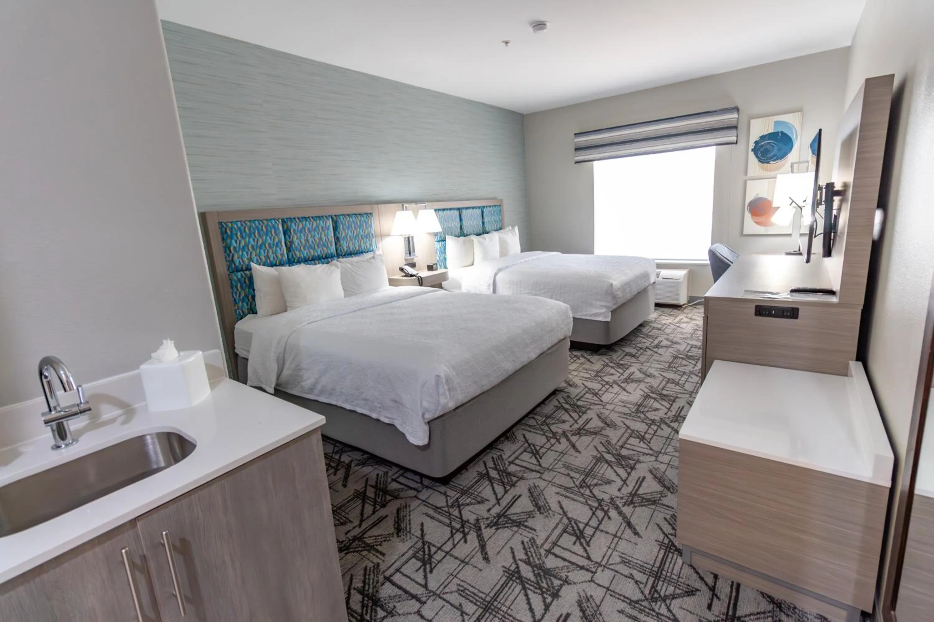 Bed in Hampton Inn & Suites Denton