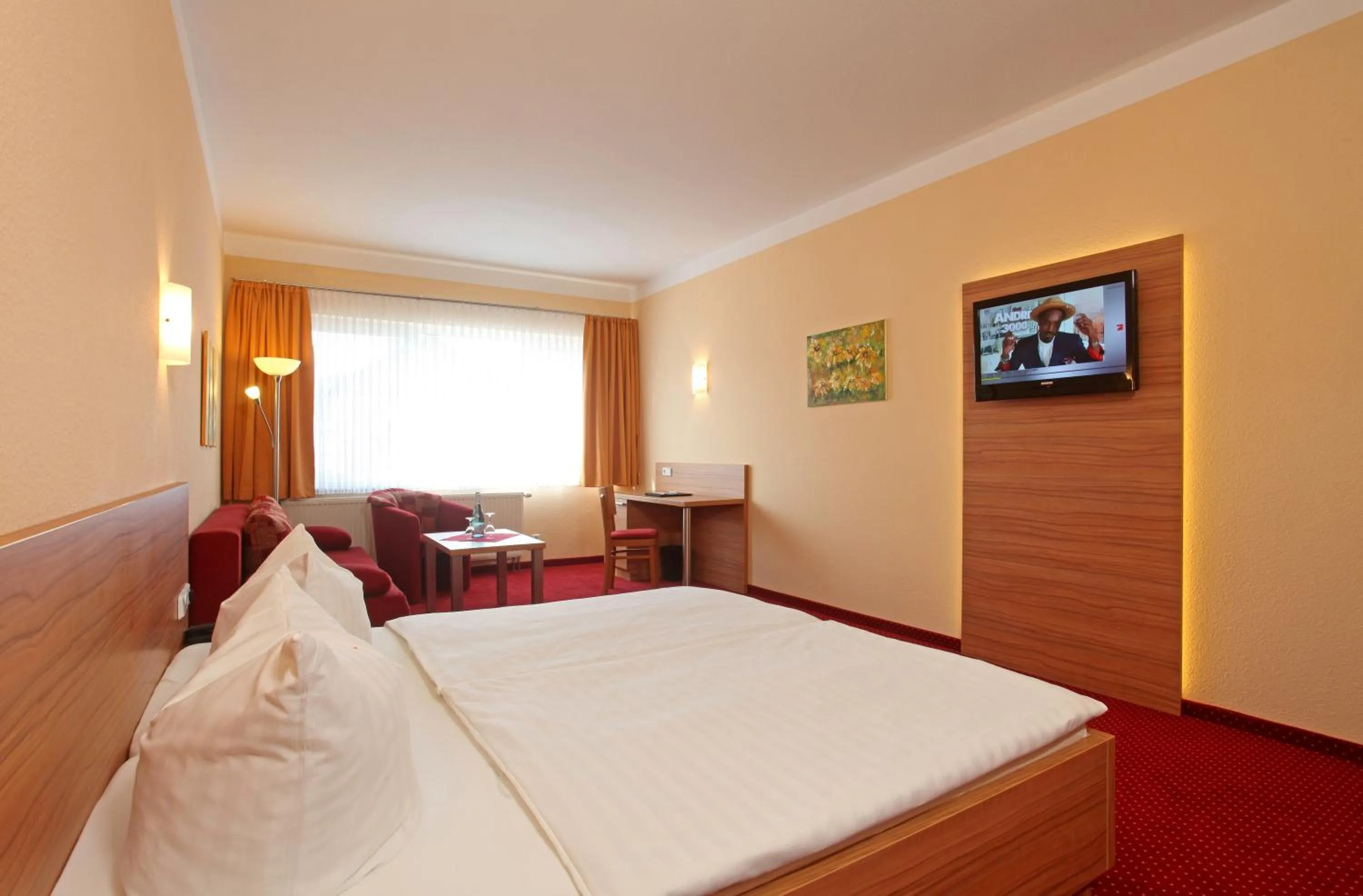Photo of the whole room, Bed in Sporthotel Neuruppin