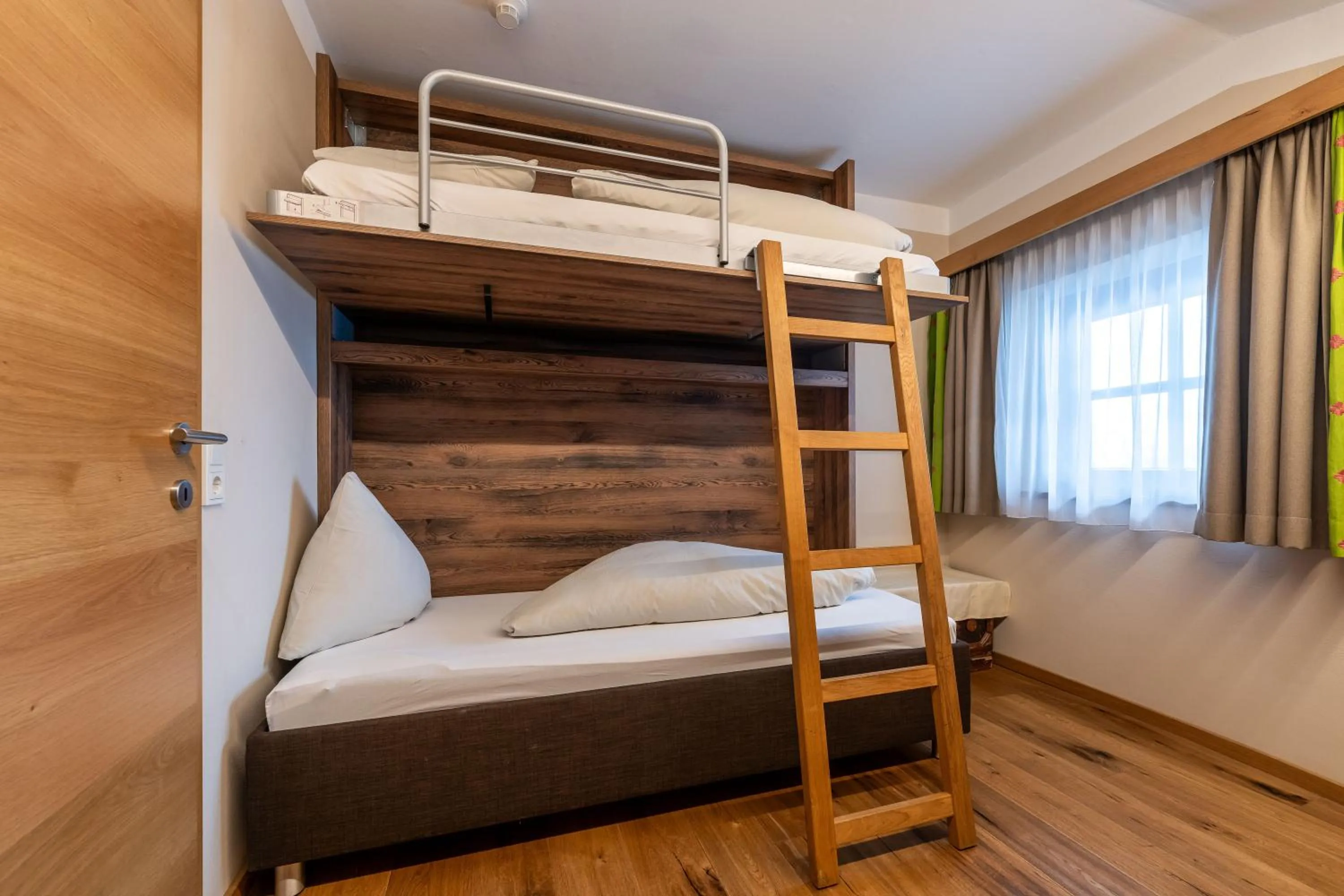 Photo of the whole room, Bed in Hotel zum Hirschen Zell am See