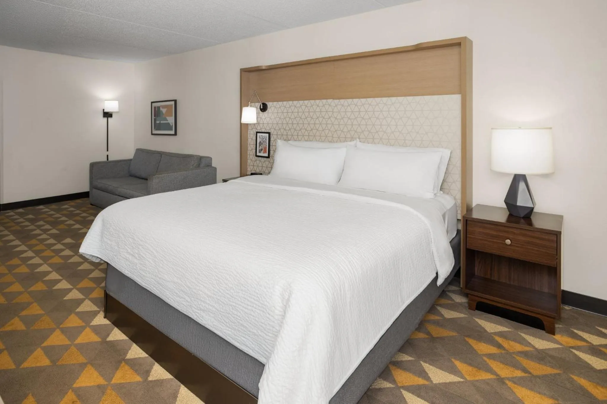 Photo of the whole room, Bed in Holiday Inn Morgantown - Reading Area by IHG