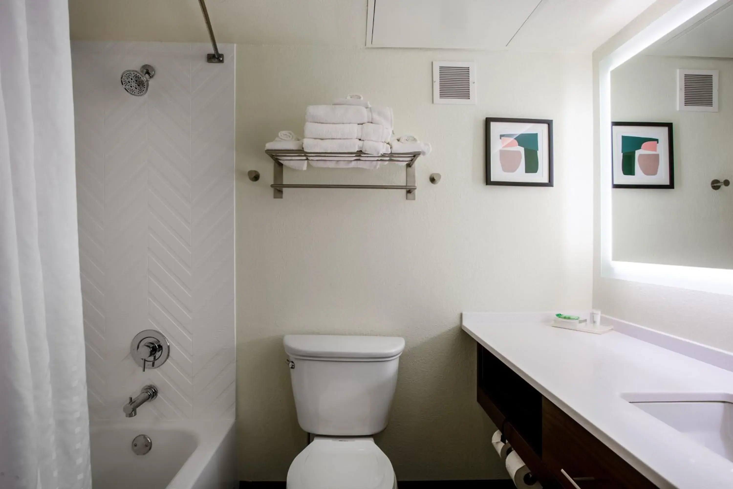Bathroom in Holiday Inn Morgantown - Reading Area by IHG Bathroom in Holiday Inn Morgantown - Reading Area by IHG