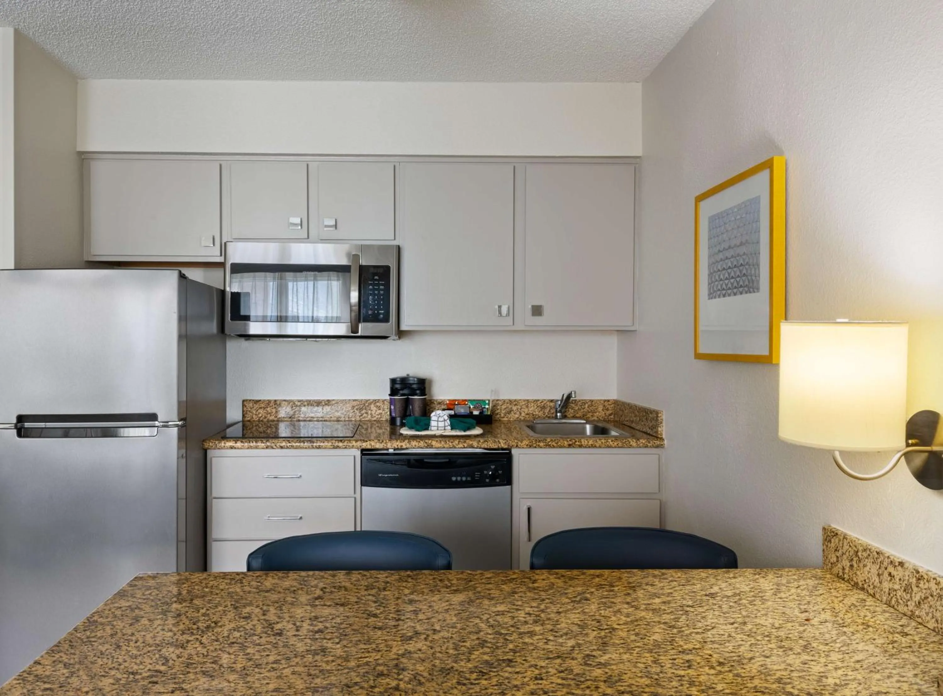 Kitchen or kitchenette in Homewood Suites by Hilton Lake Mary Orlando North