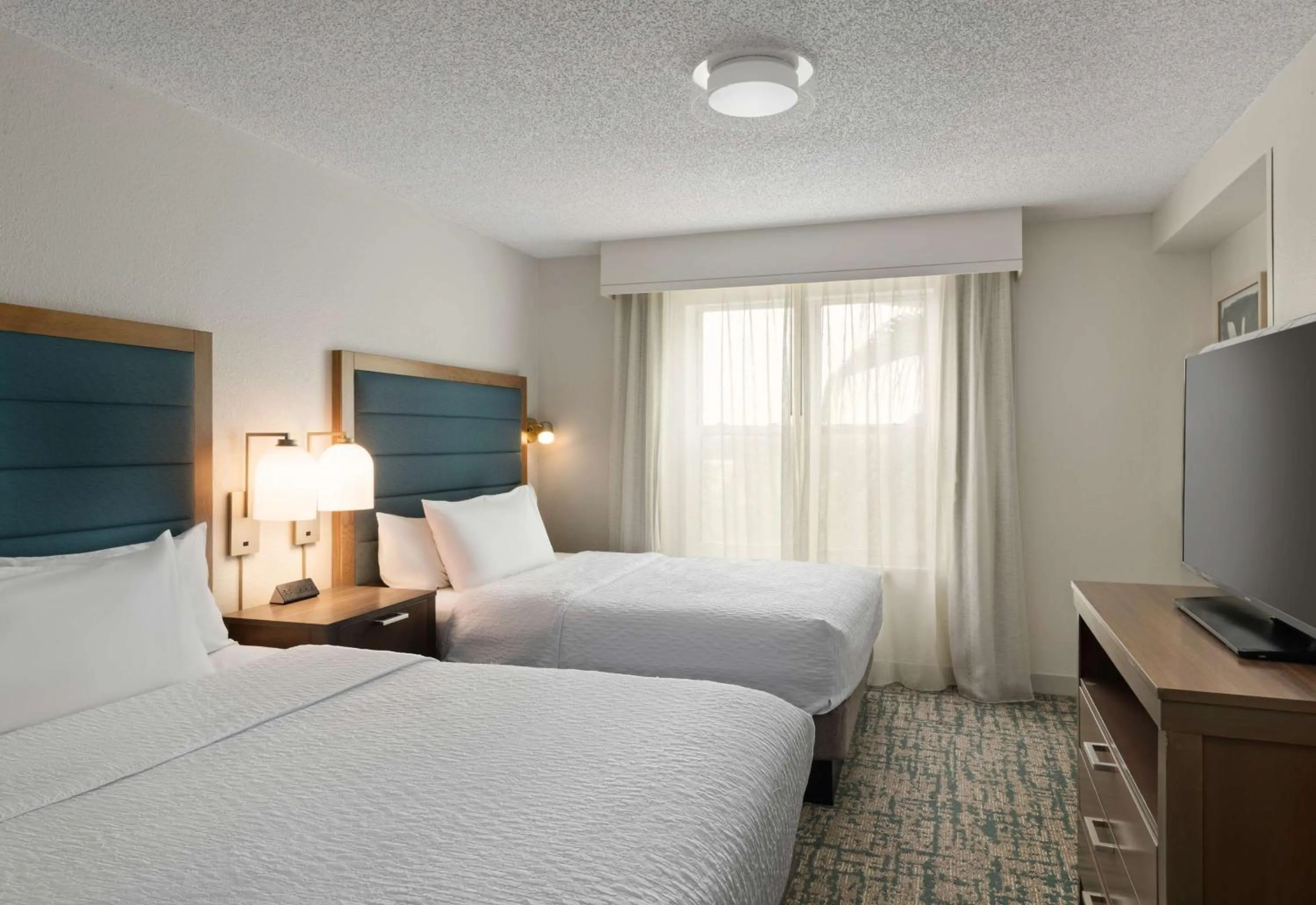 Bed in Homewood Suites by Hilton Lake Mary Orlando North