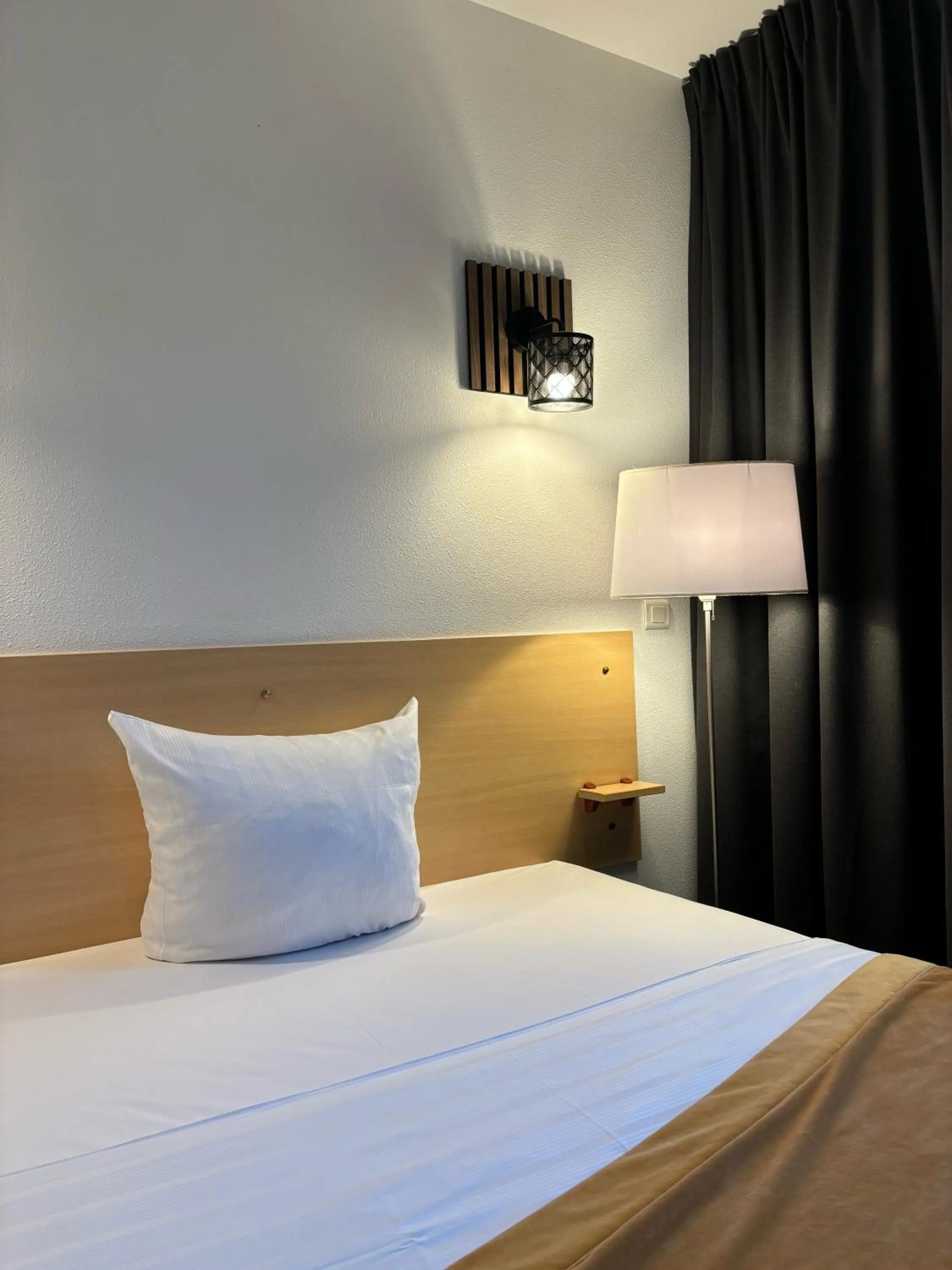 Bed in Hotel Premium