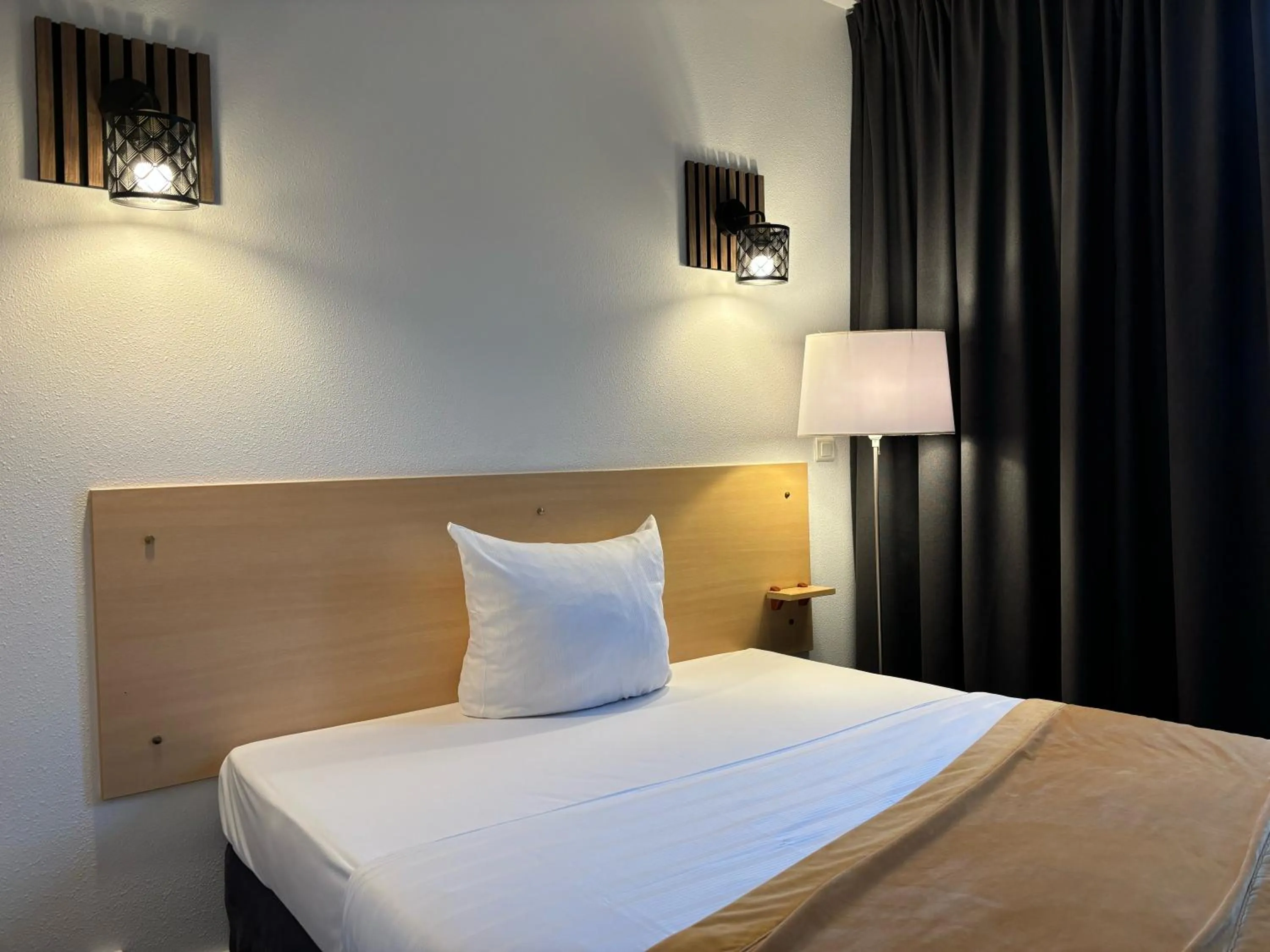 Bed in Hotel Premium