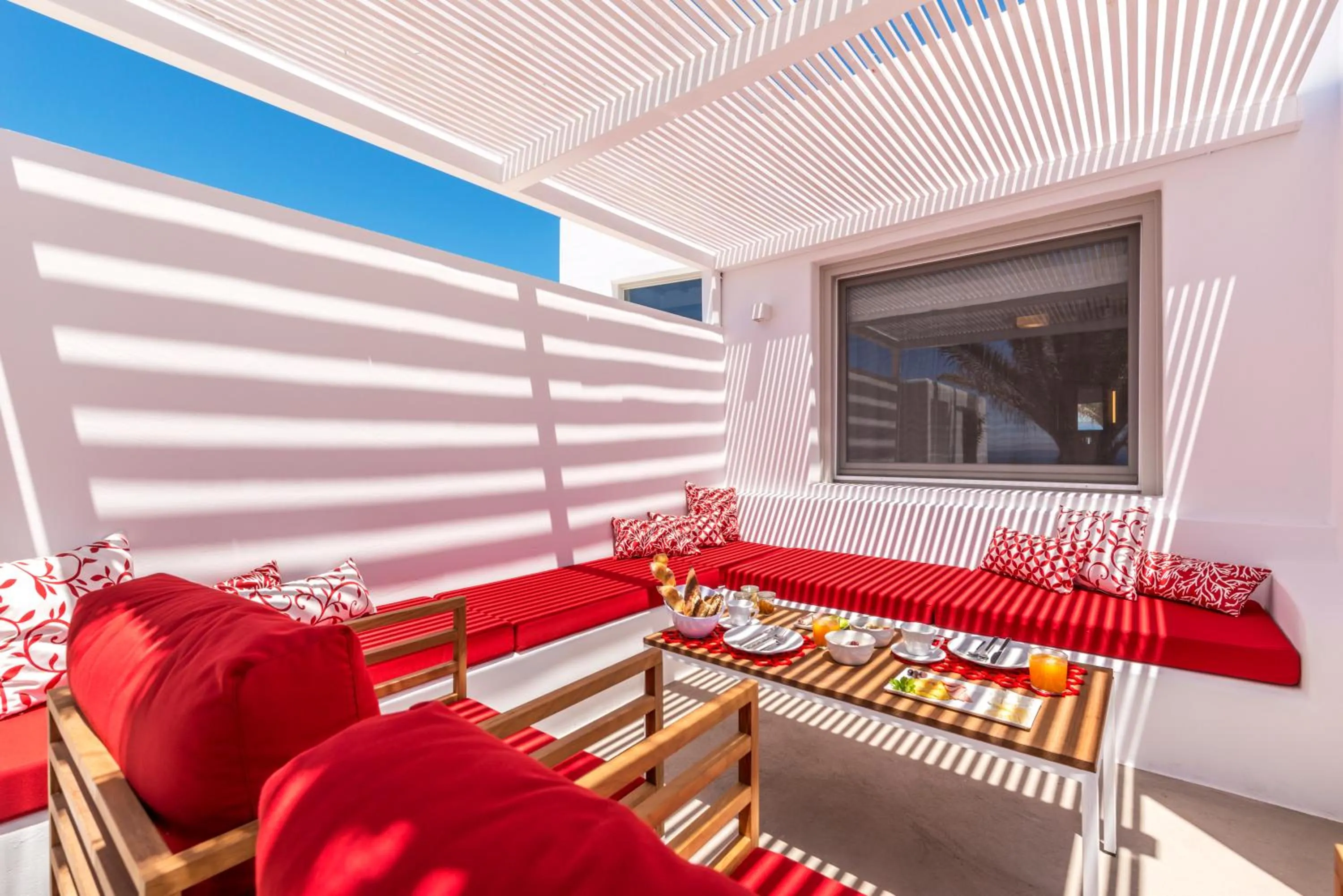 Seating area in O Lofos Luxury Boutique Suites