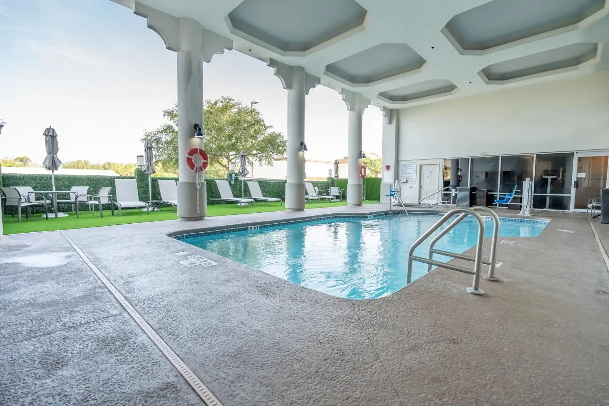 Swimming pool in Holiday Inn Express Hotel & Suites Cocoa Beach by IHG Swimming pool in Holiday Inn Express Hotel & Suites Cocoa Beach by IHG