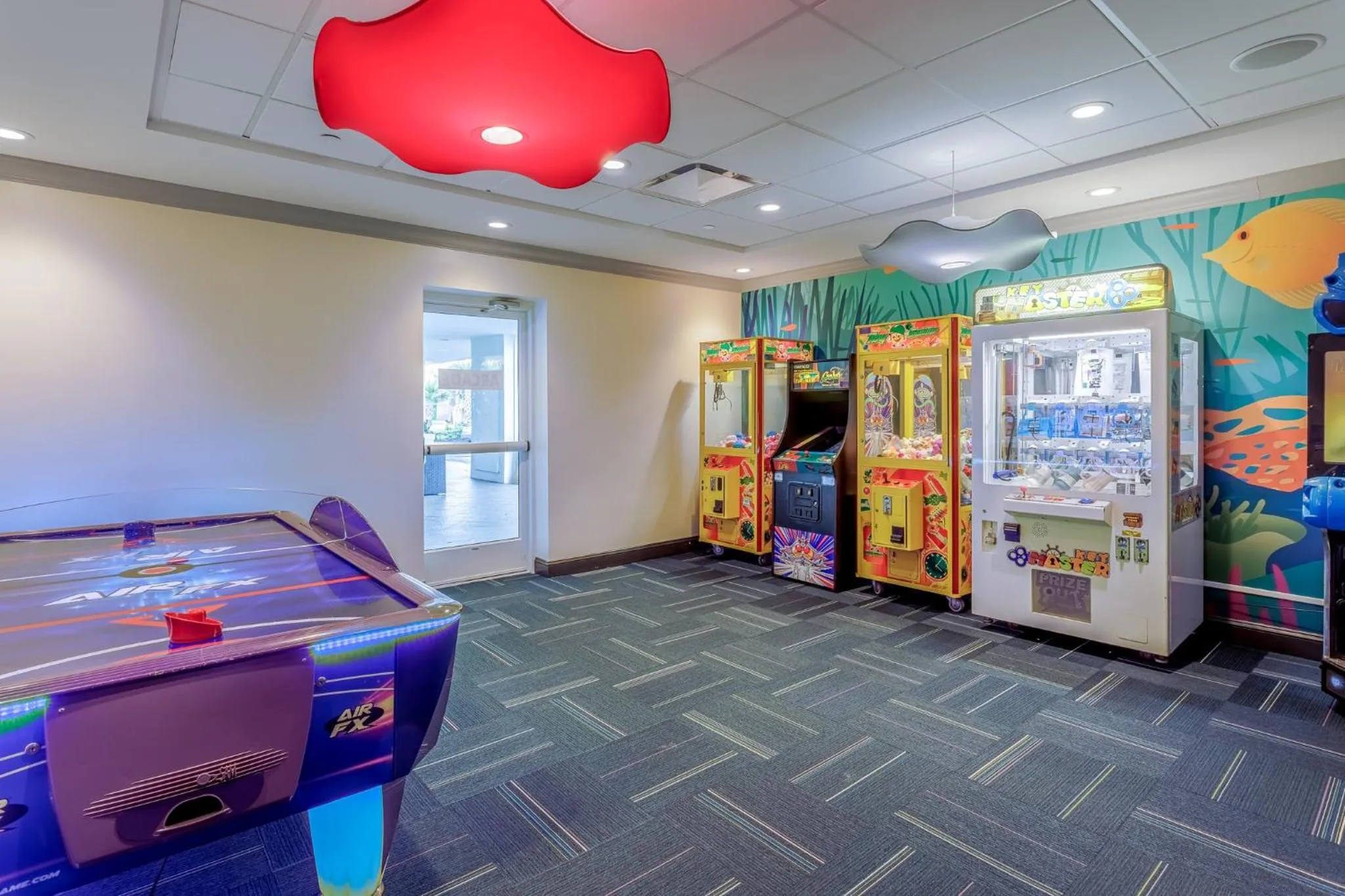 Game Room in Holiday Inn Resort Oceanfront at Surfside Beach by IHG