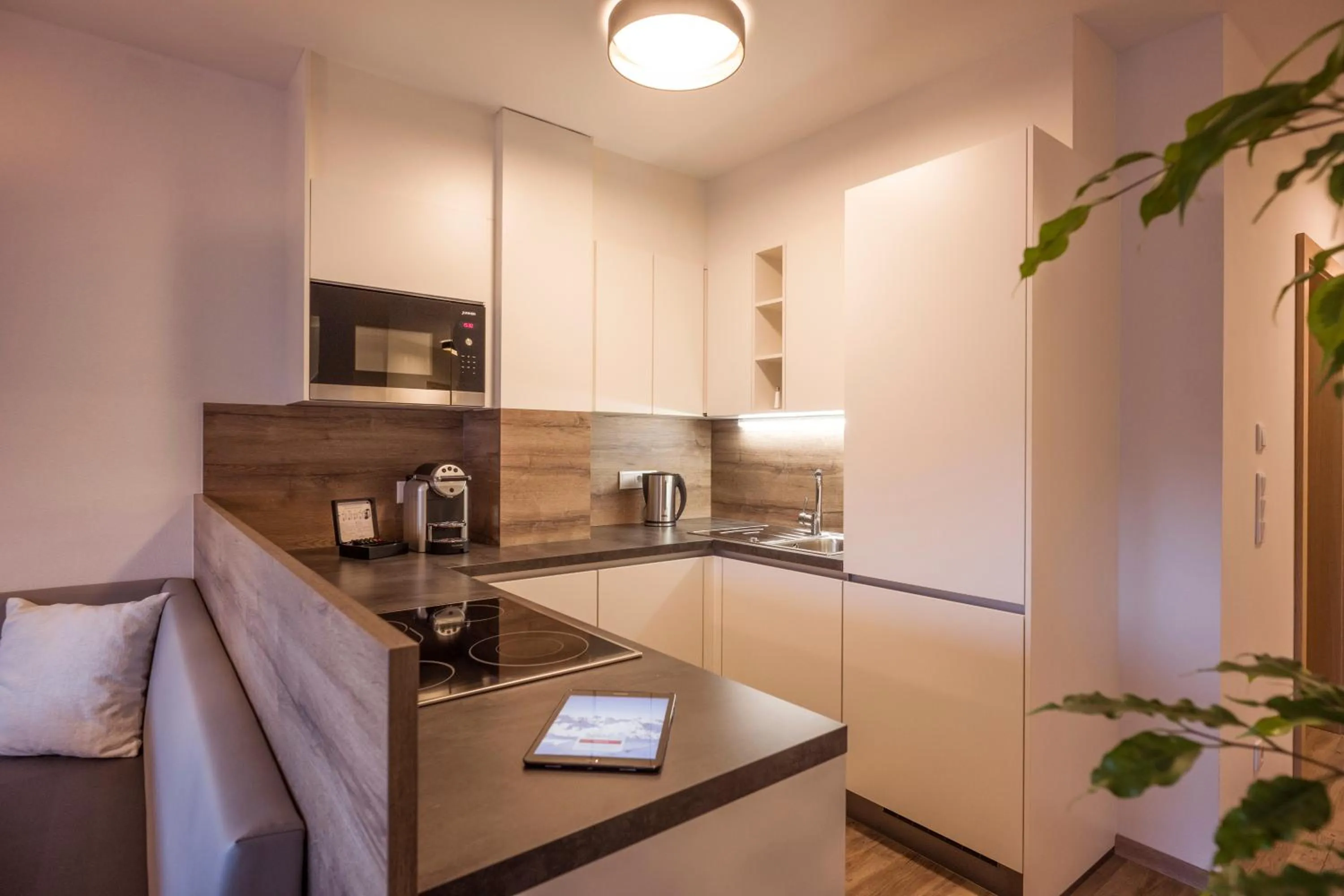 Kitchen or kitchenette in Aparthotel AlpTirol