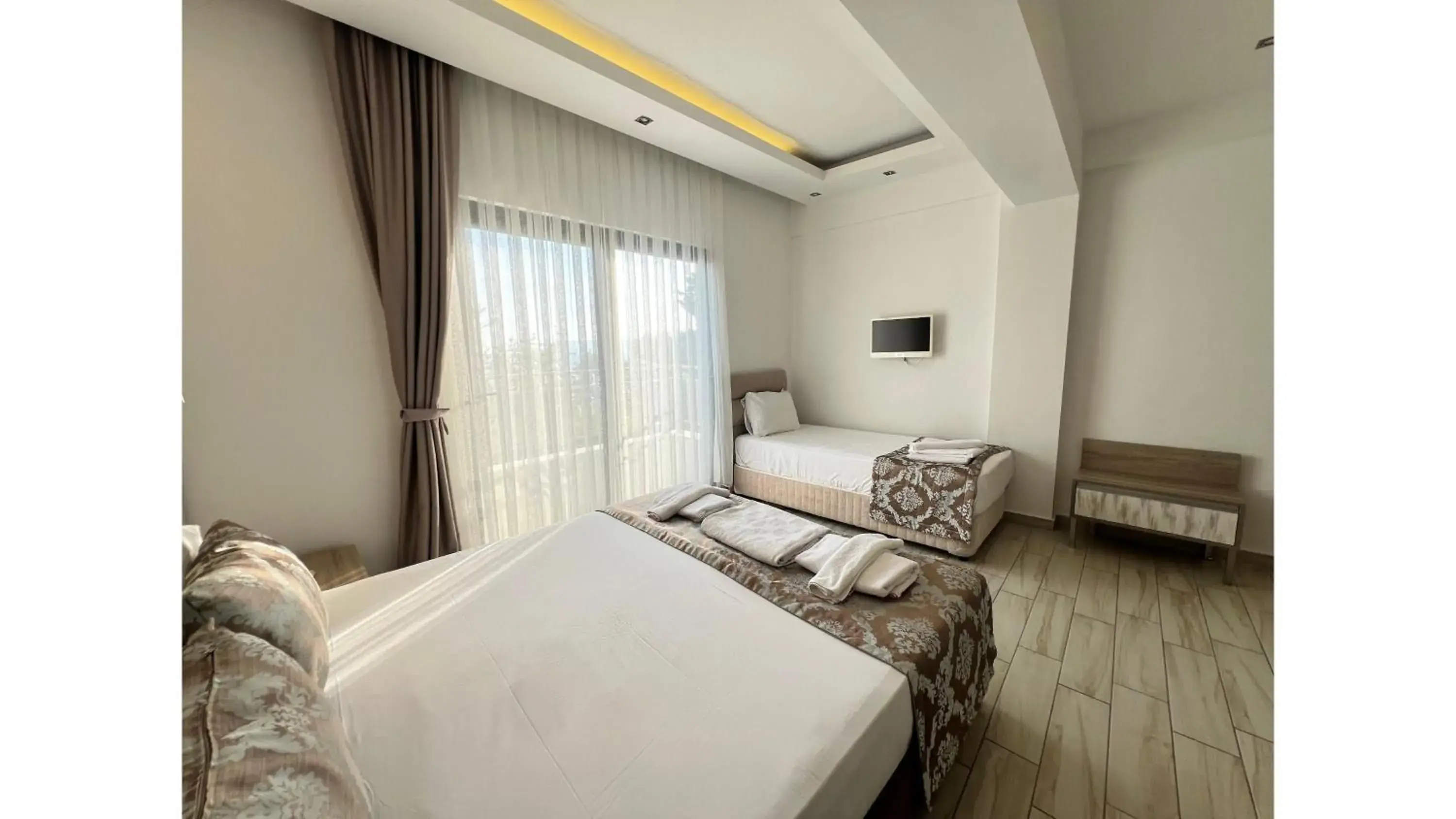 Photo of the whole room, Bed in Sardunya Andifli Otel Photo of the whole room, Bed in Sardunya Andifli Otel