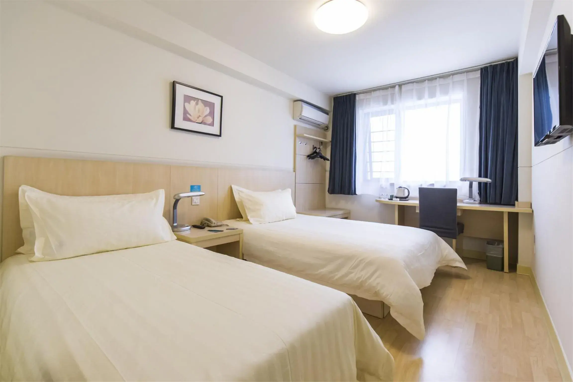 Bedroom, Bed in Jinjiang Inn Changchun Quan’an Square Bedroom, Bed in Jinjiang Inn Changchun Quan’an Square