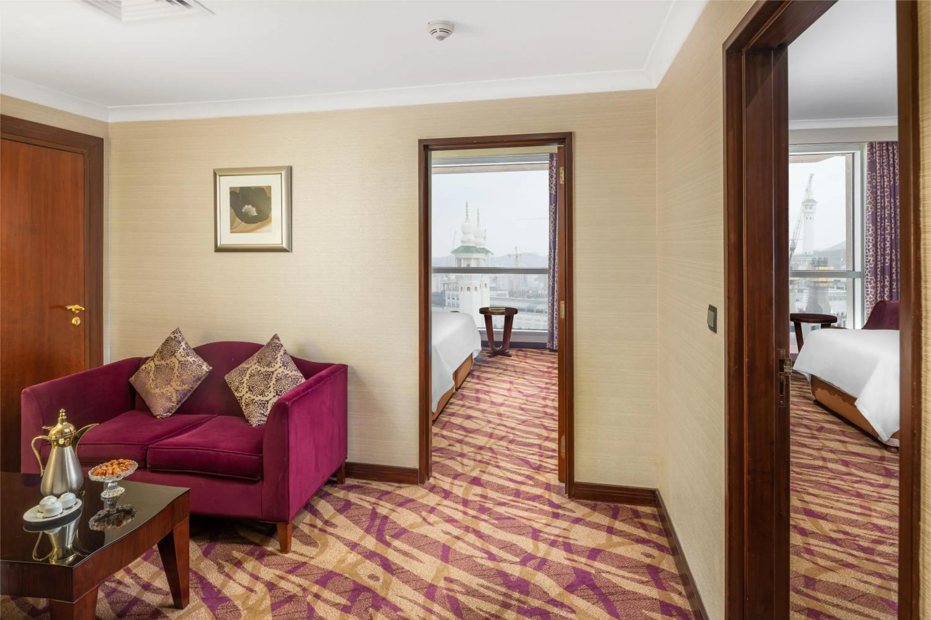 Seating area, Bed in Al Marwa Rayhaan by Rotana - Makkah