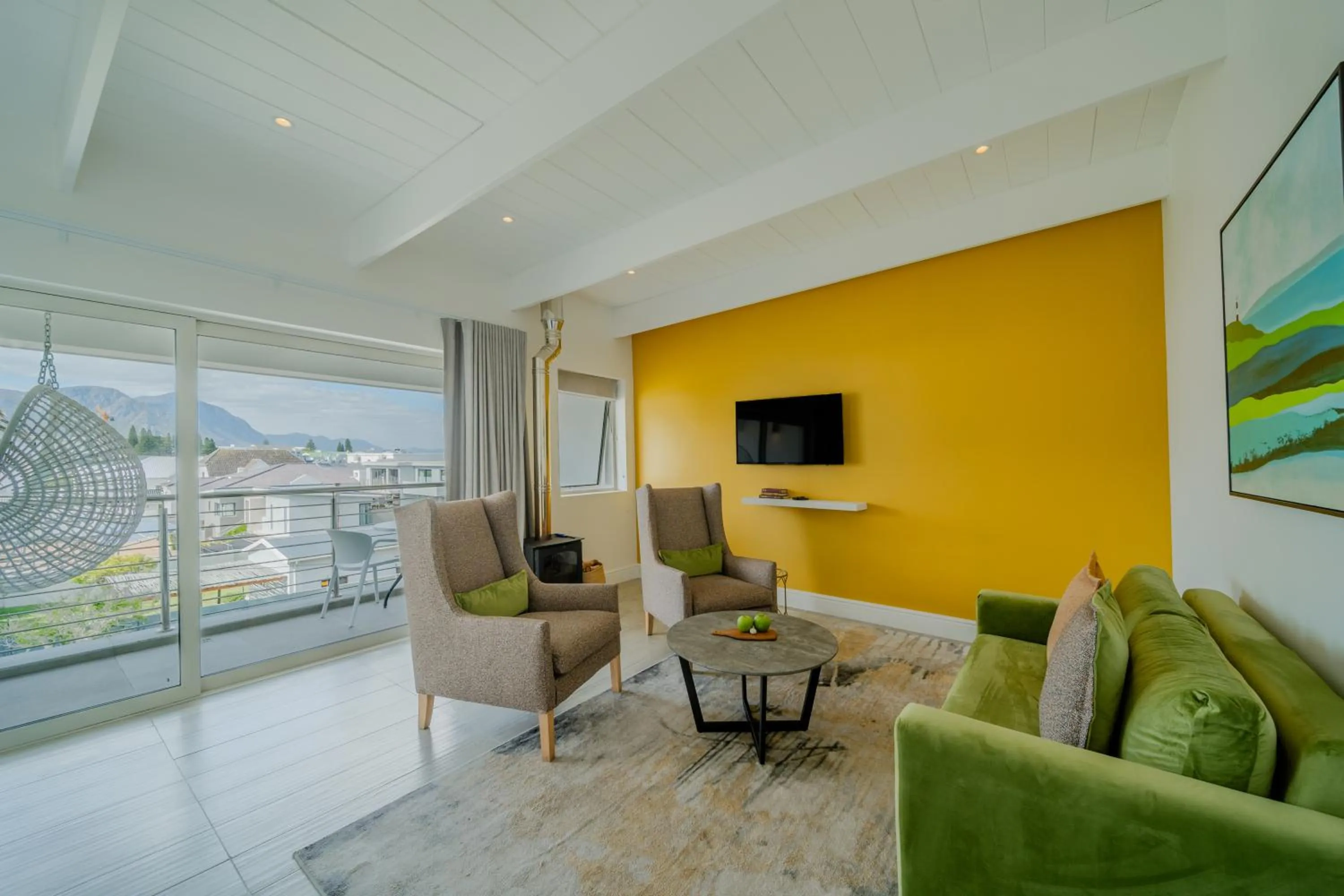 Communal lounge/ TV room in One Marine Drive Boutique Hotel & Spa by The Living Journey Collection