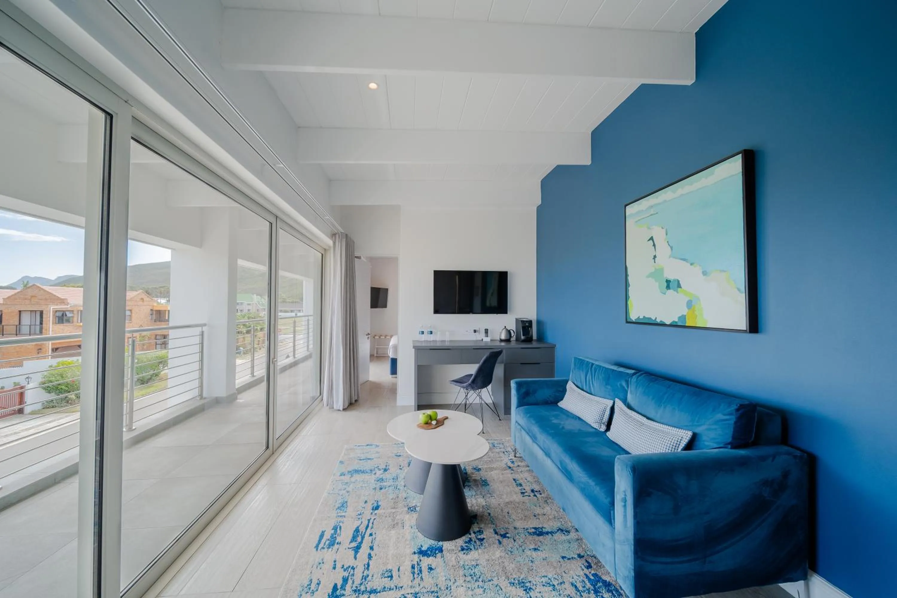 TV and multimedia in One Marine Drive Boutique Hotel & Spa by The Living Journey Collection