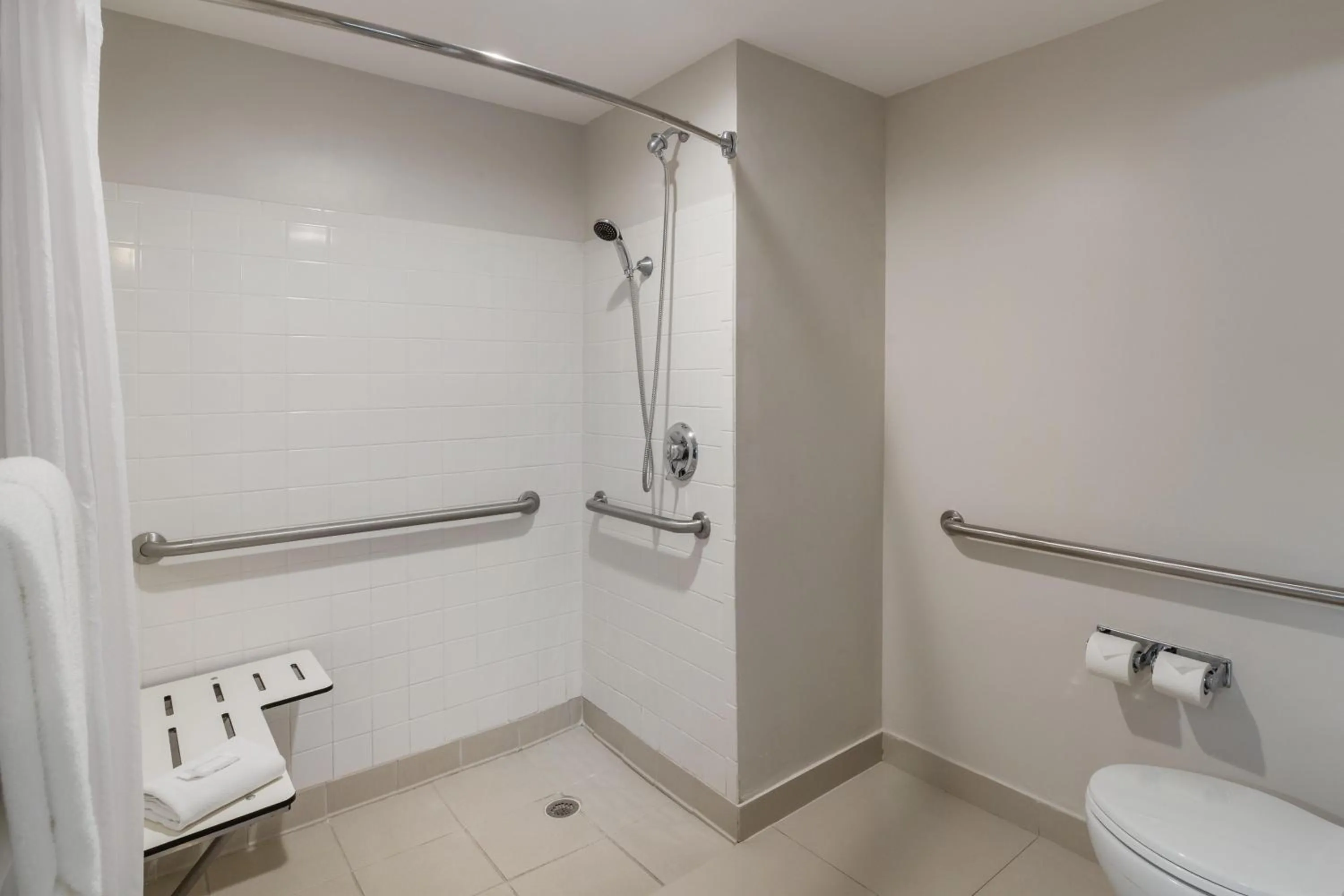 Bathroom in HOM Hotel Gainesville, SureStay Collection by Best Western