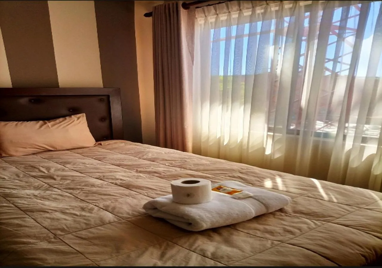 Photo of the whole room, Bed in Las Tholas Hotel