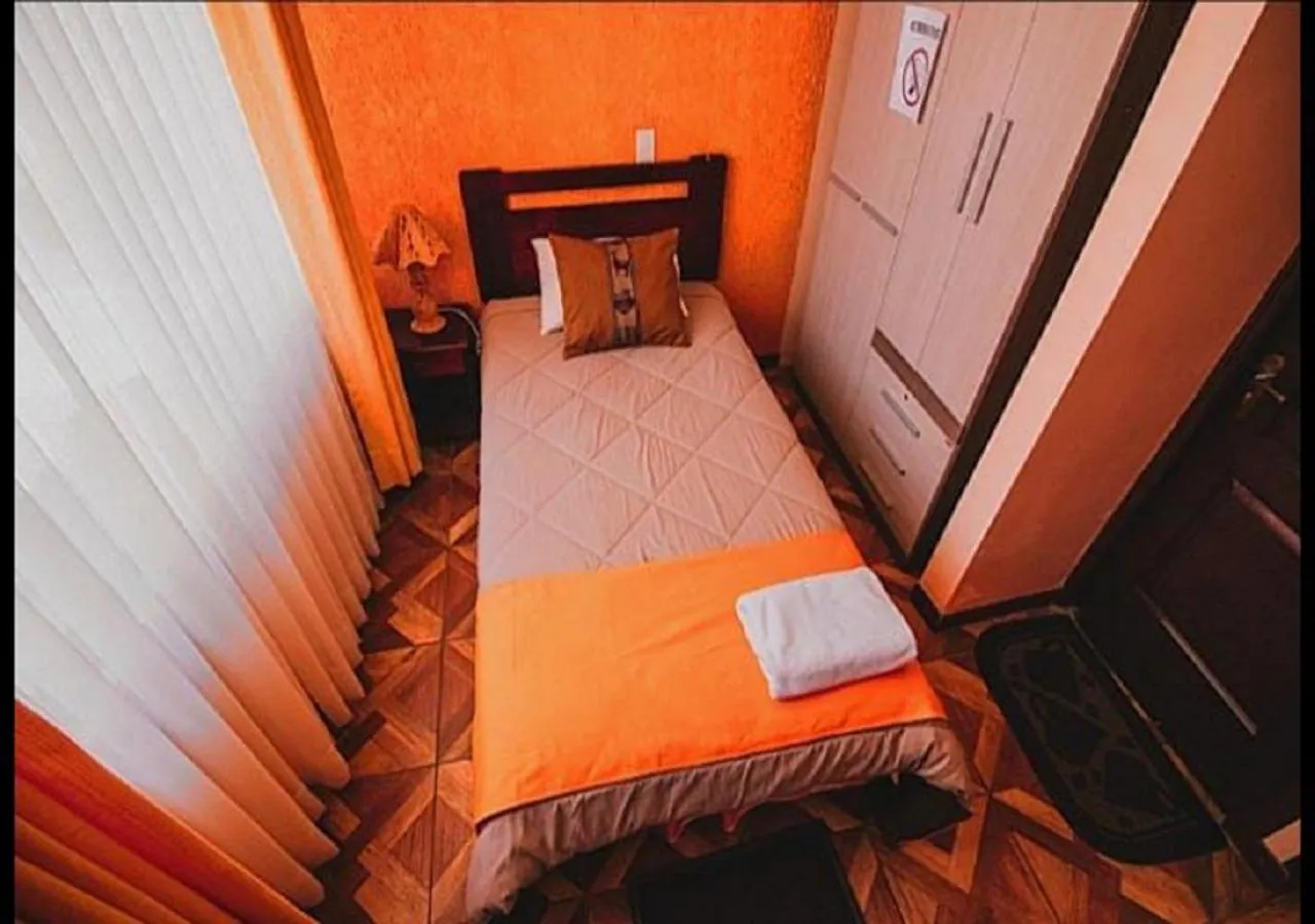 Photo of the whole room, Bed in Las Tholas Hotel