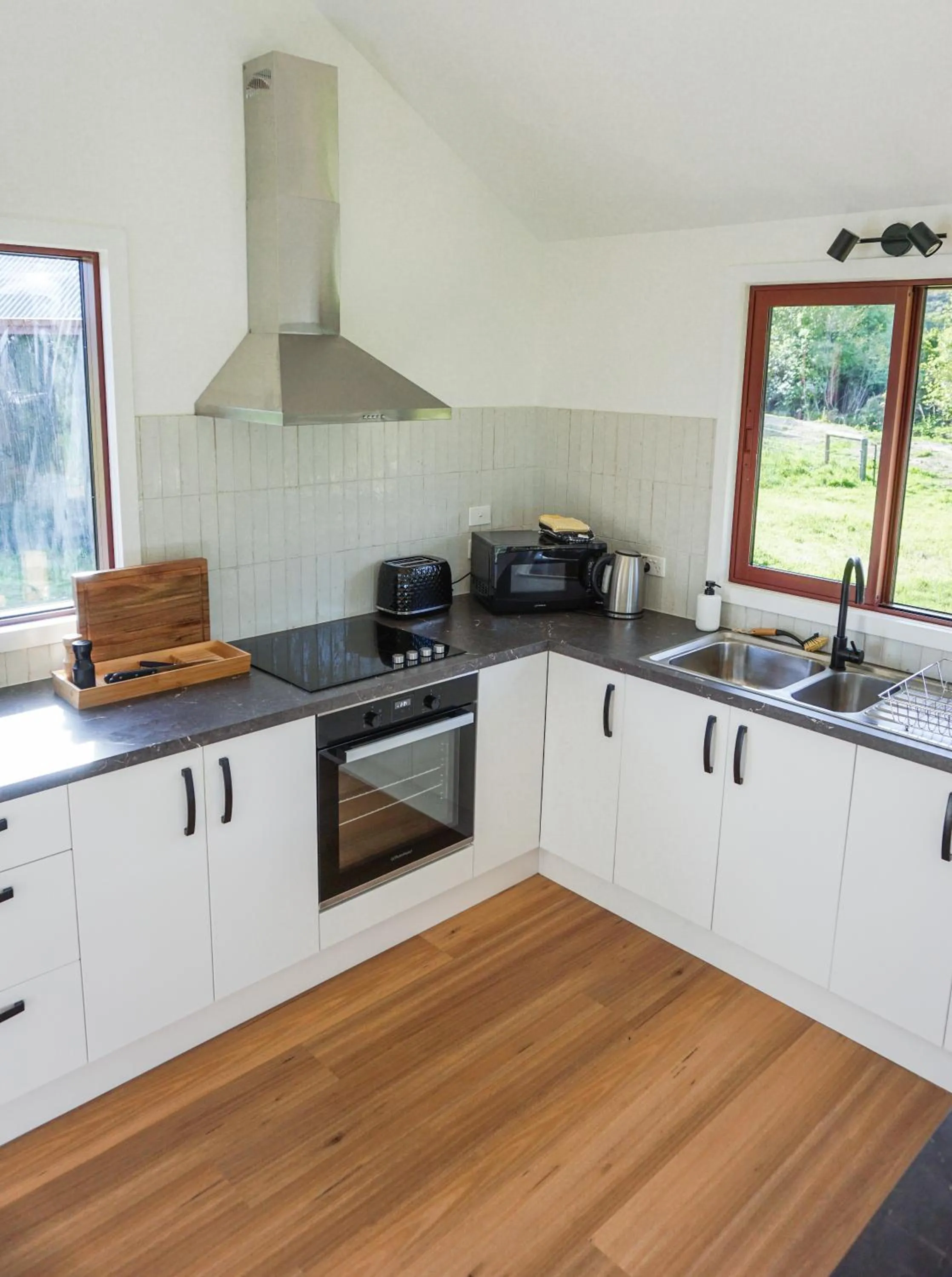 Kitchen or kitchenette in The Barn Cabins & Camp