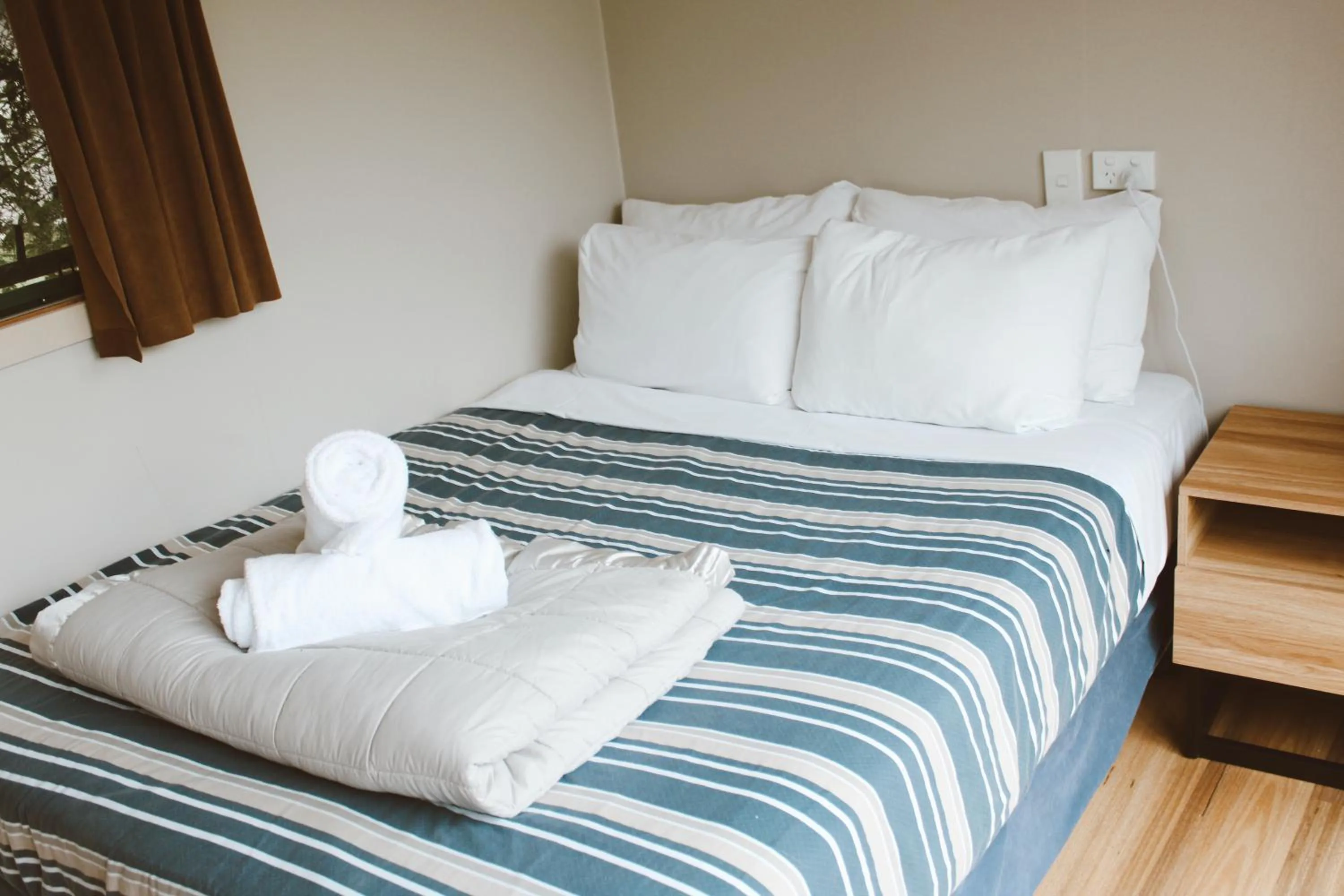 Bedroom, Bed in The Barn Cabins & Camp