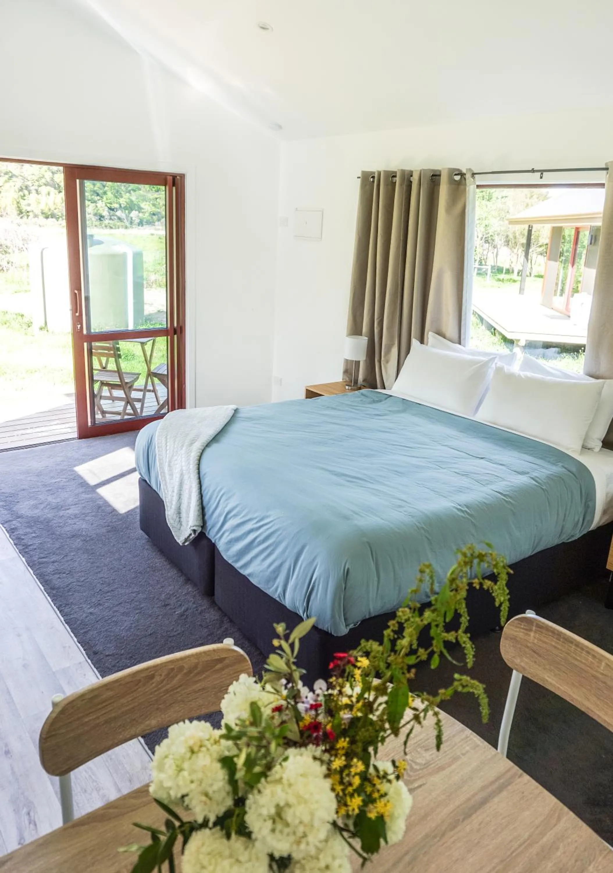 Patio, Bed in The Barn Cabins & Camp