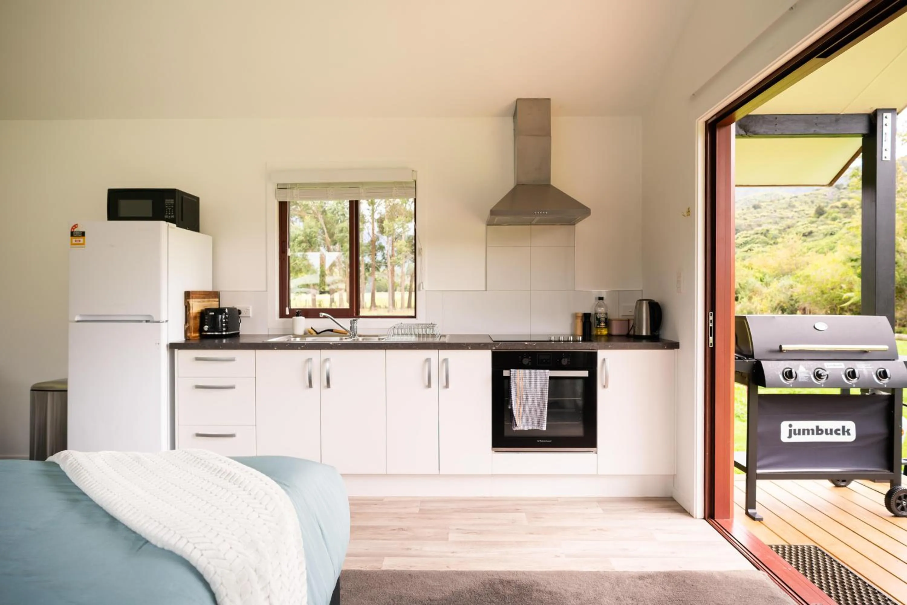 Kitchen or kitchenette in The Barn Cabins & Camp