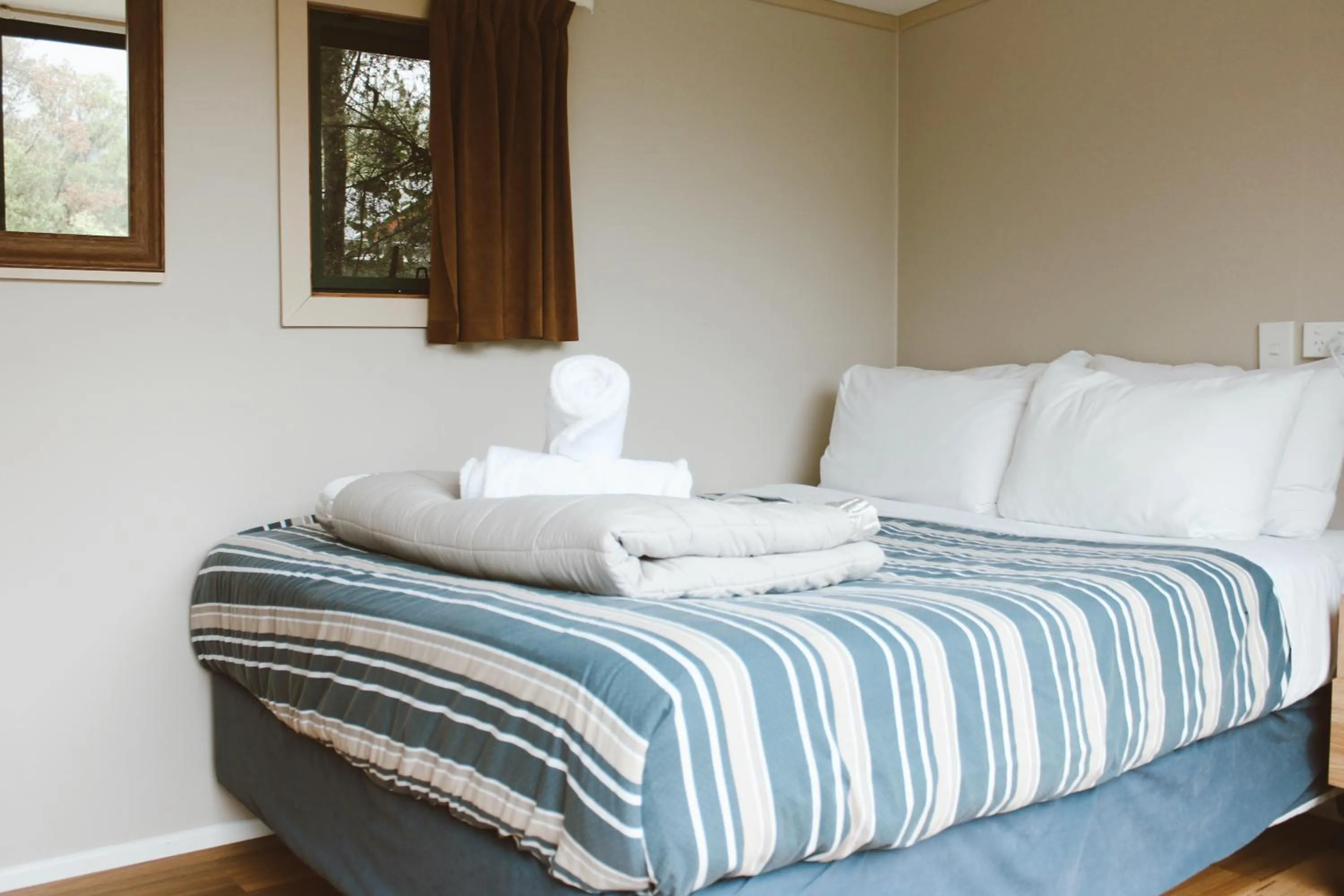 Bed in The Barn Cabins & Camp