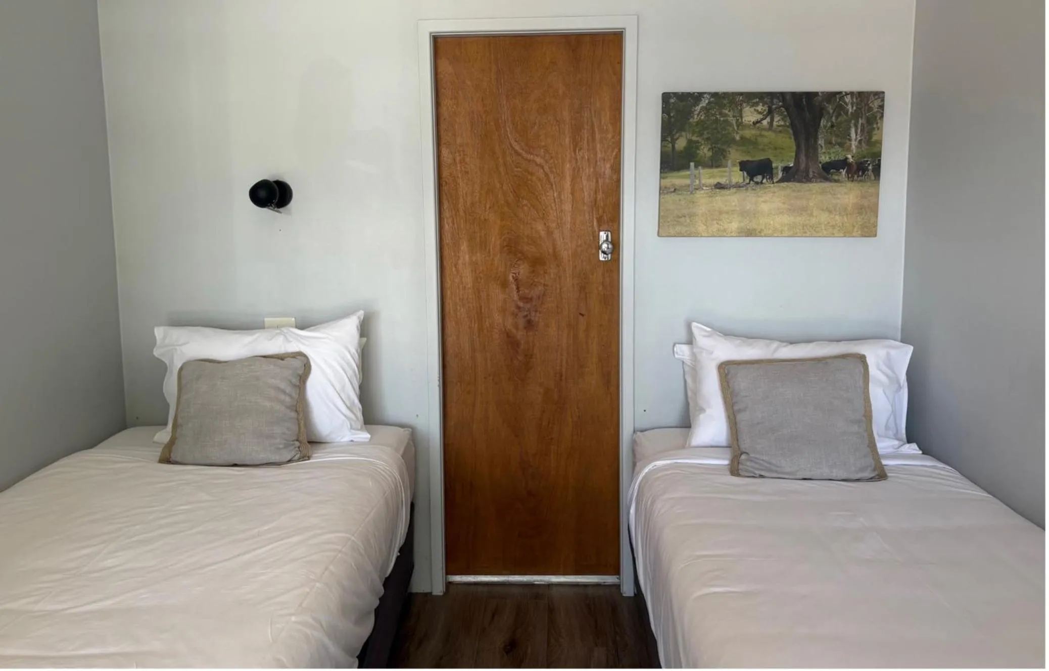 Bed in Tall Timbers Motel