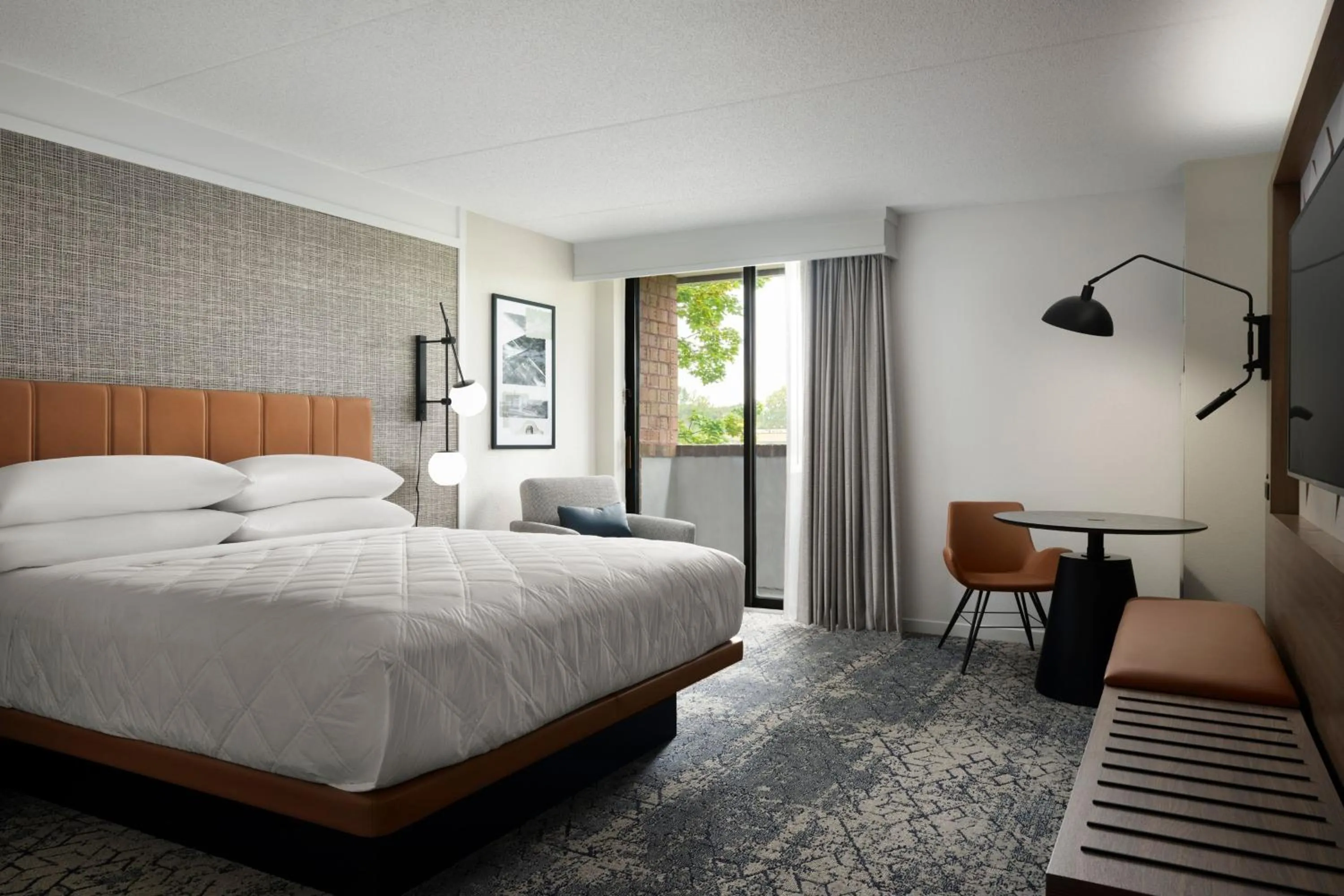 Photo of the whole room, Bed in Sheraton Grand Rapids Airport Hotel