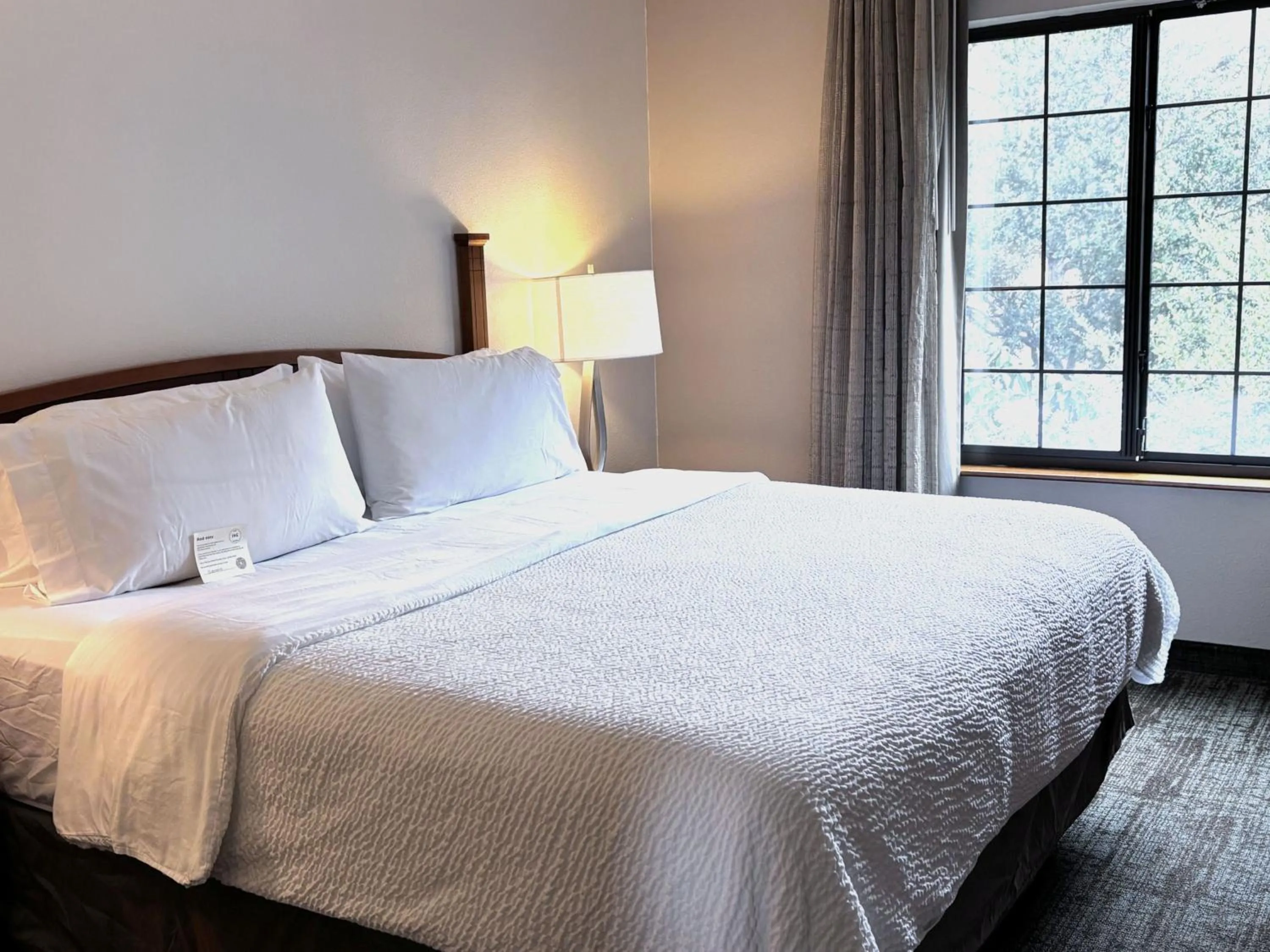 Photo of the whole room, Bed in Staybridge Suites Houston West - Energy Corridor by IHG