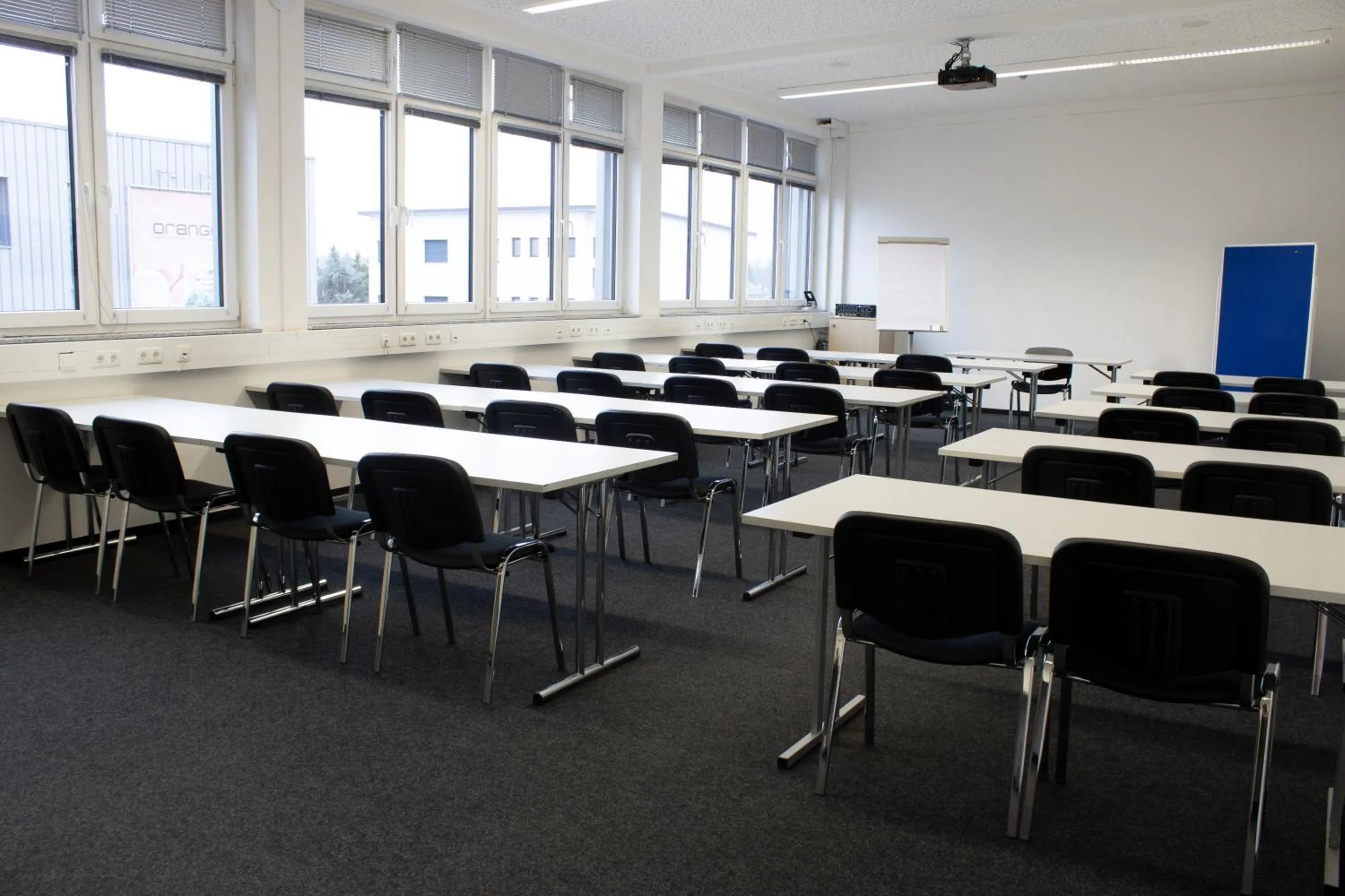 Meeting/conference room in Orange Hotel und Apartments