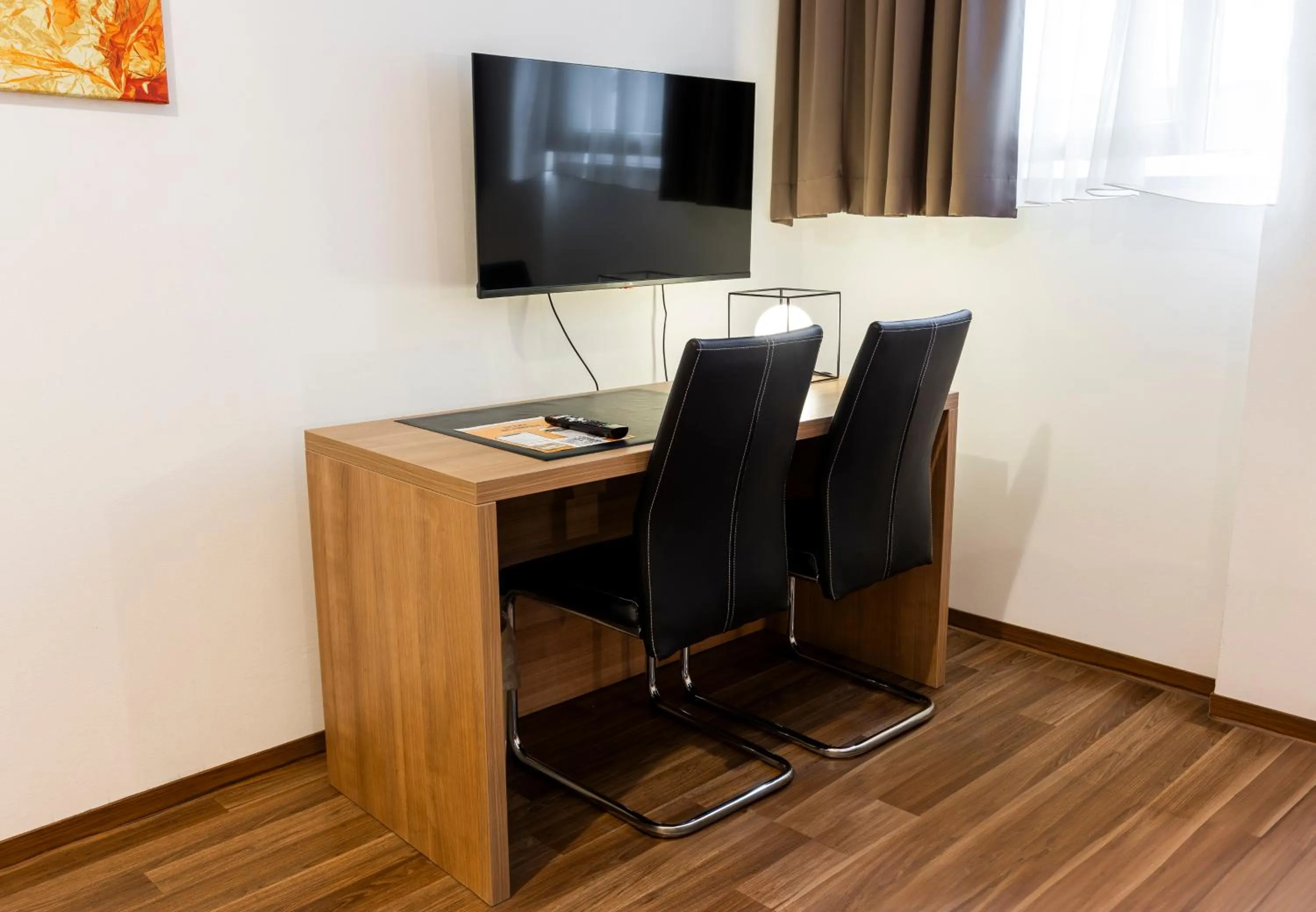 Orange Hotel und Apartments