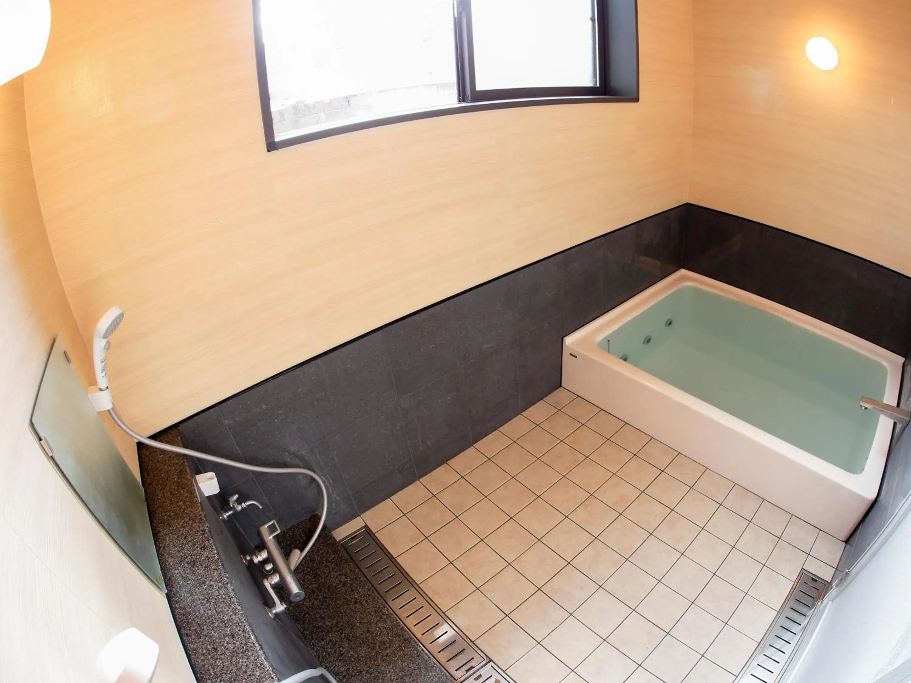 Bathroom in Onsenminshuku Kosakaya Bathroom in Onsenminshuku Kosakaya