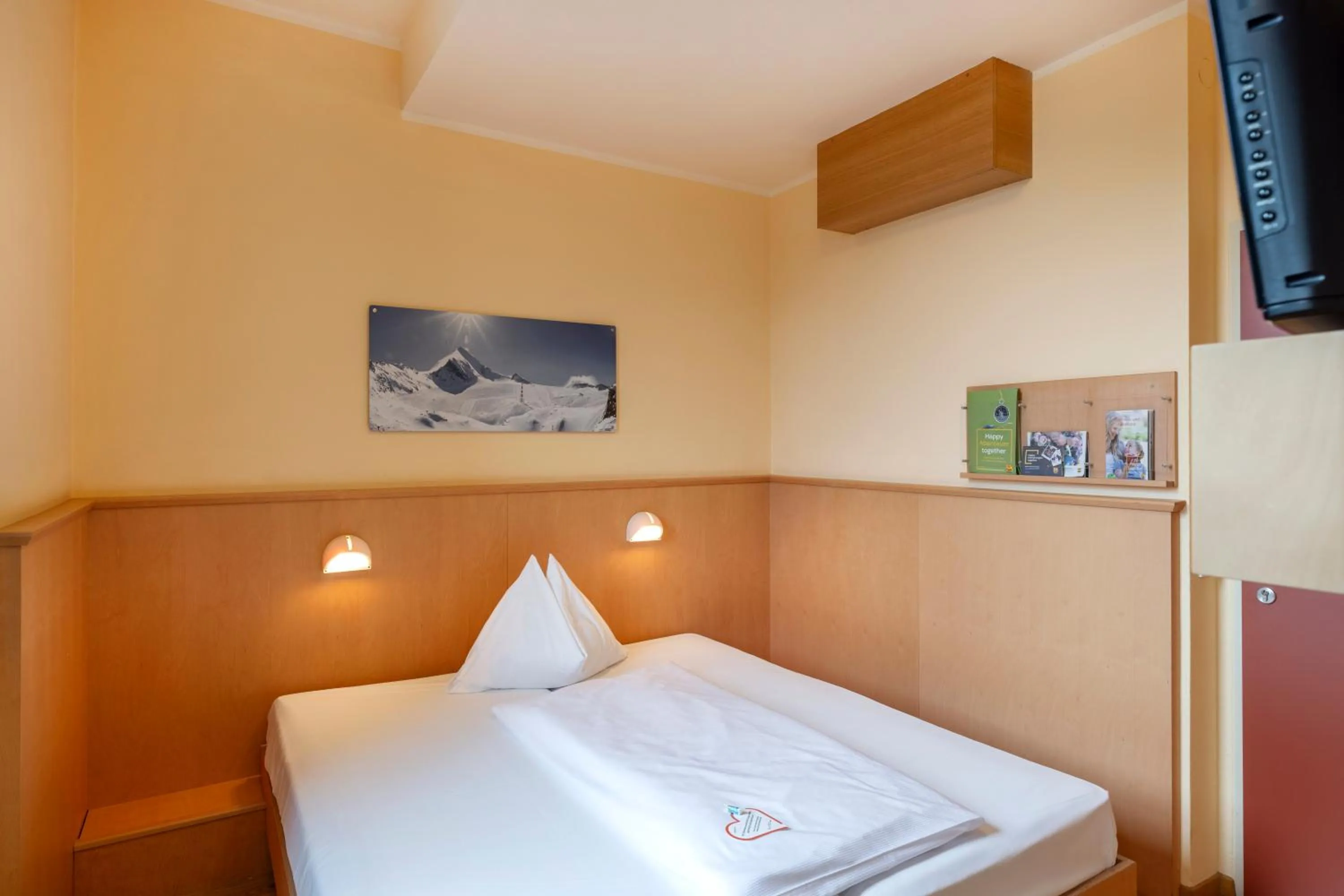 Photo of the whole room, Bed in JUFA Hotel Kaprun - Summercard included