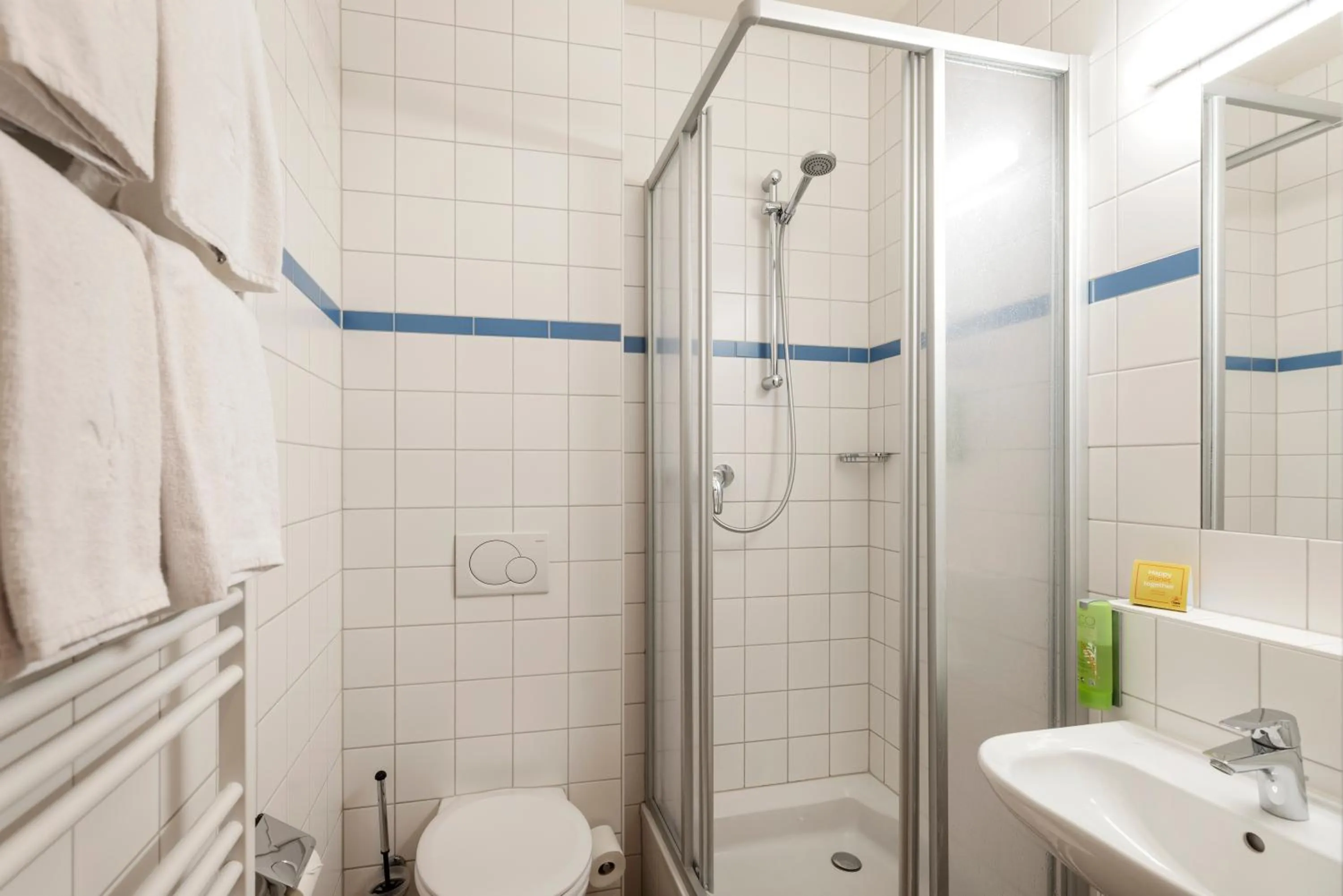 Bathroom in JUFA Hotel Kaprun - Summercard included