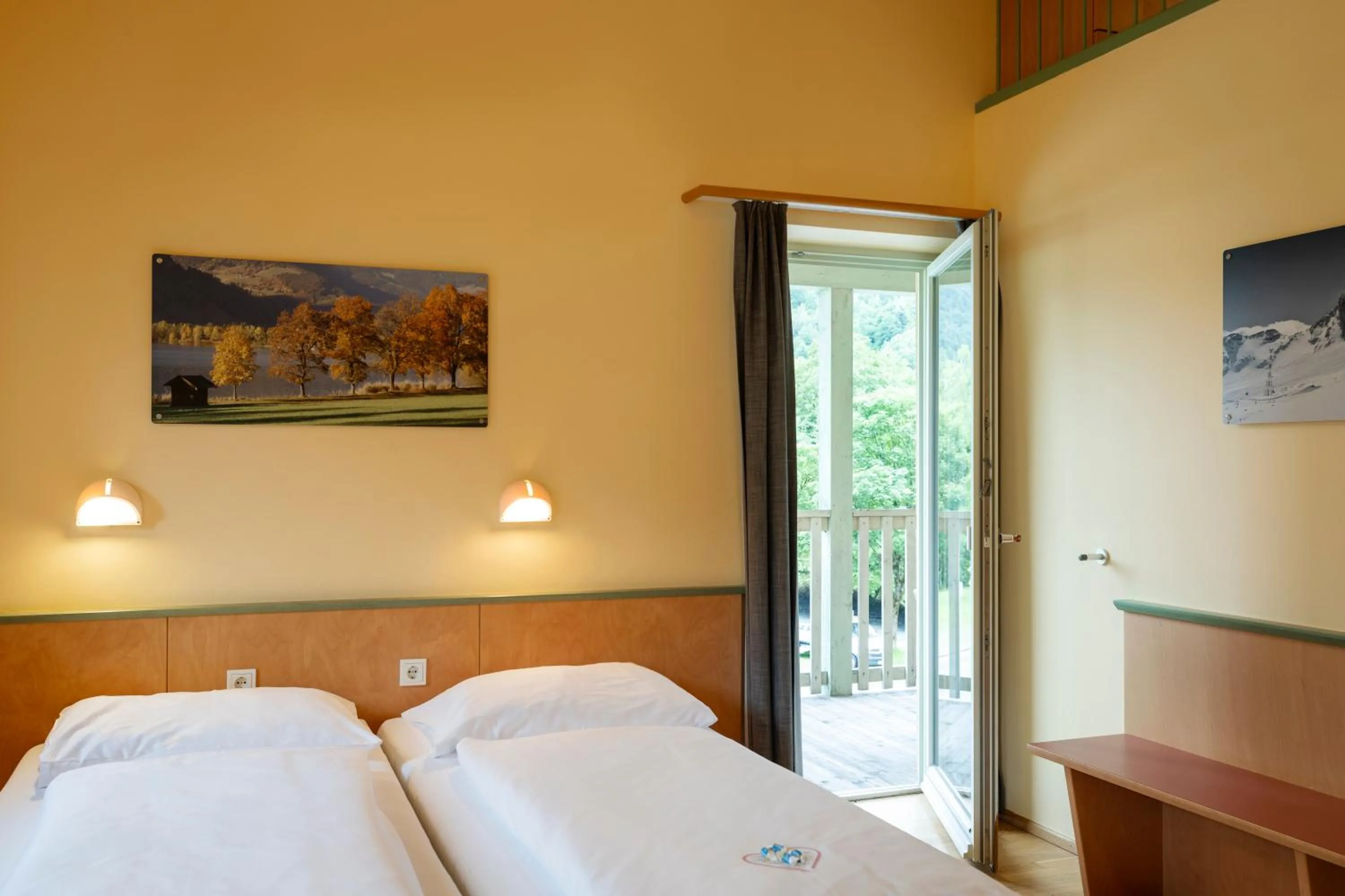 Photo of the whole room, Bed in JUFA Hotel Kaprun - Summercard included