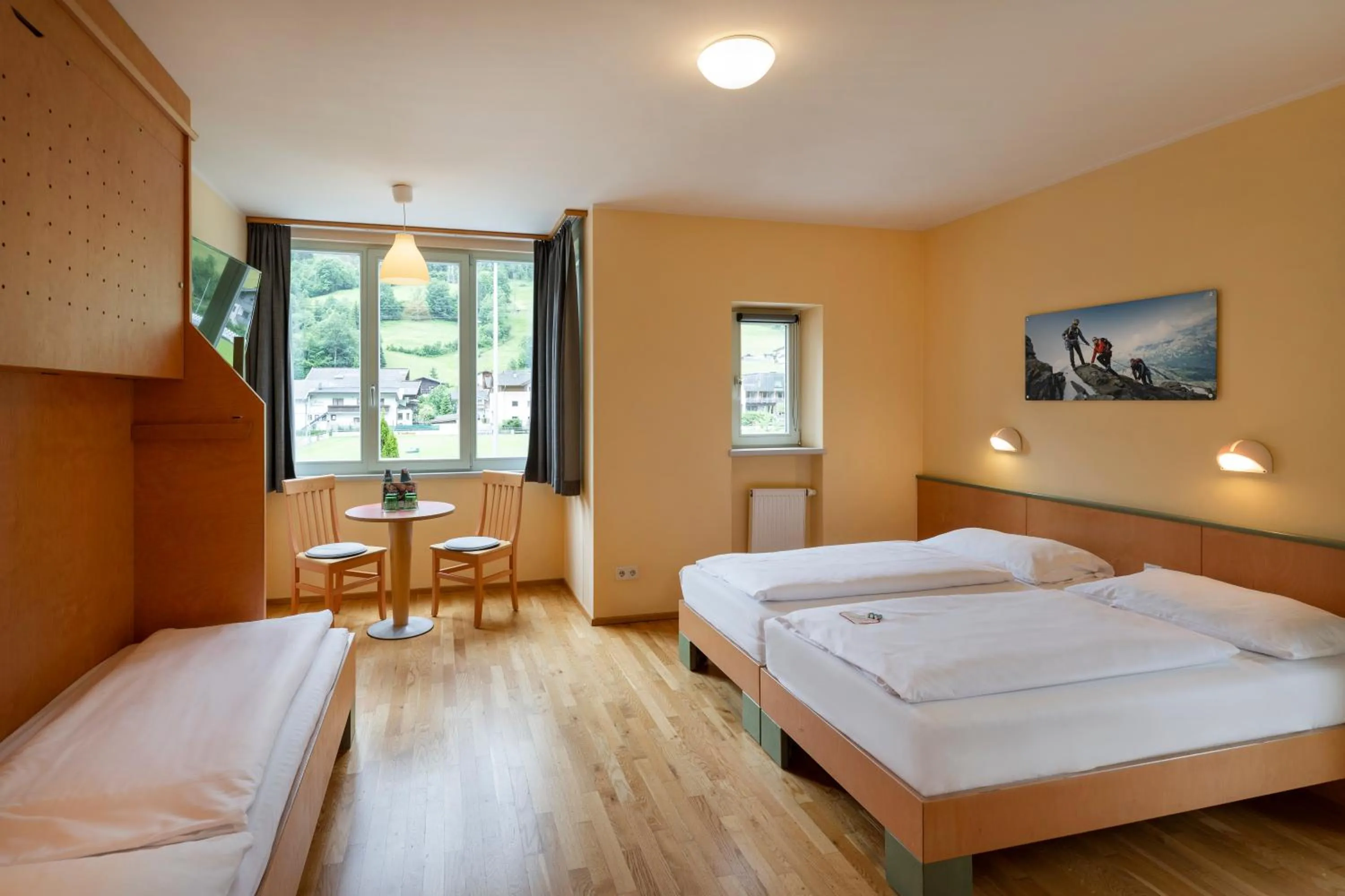 Photo of the whole room, Bed in JUFA Hotel Kaprun - Summercard included