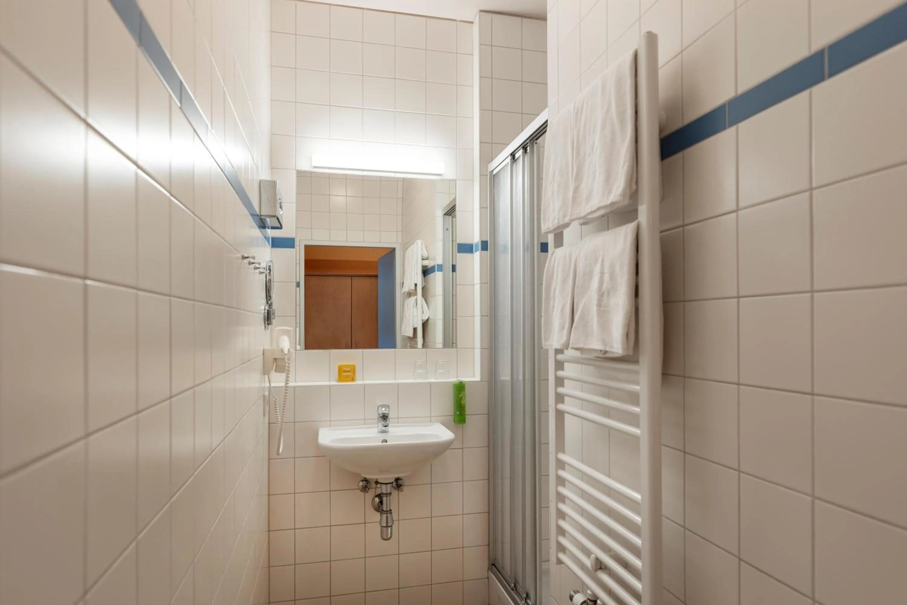 Bathroom in JUFA Hotel Kaprun - Summercard included