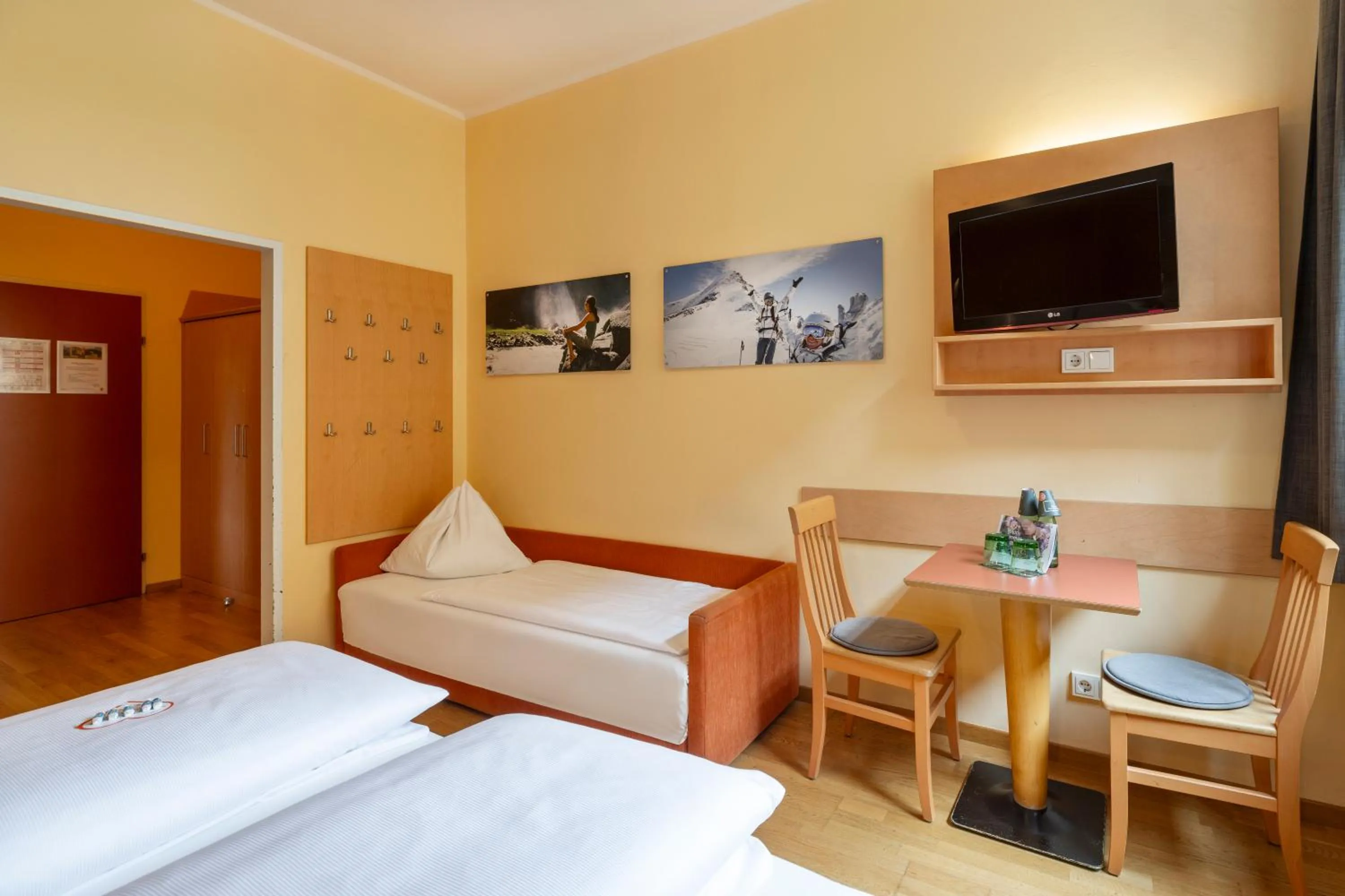 Photo of the whole room, Bed in JUFA Hotel Kaprun - Summercard included